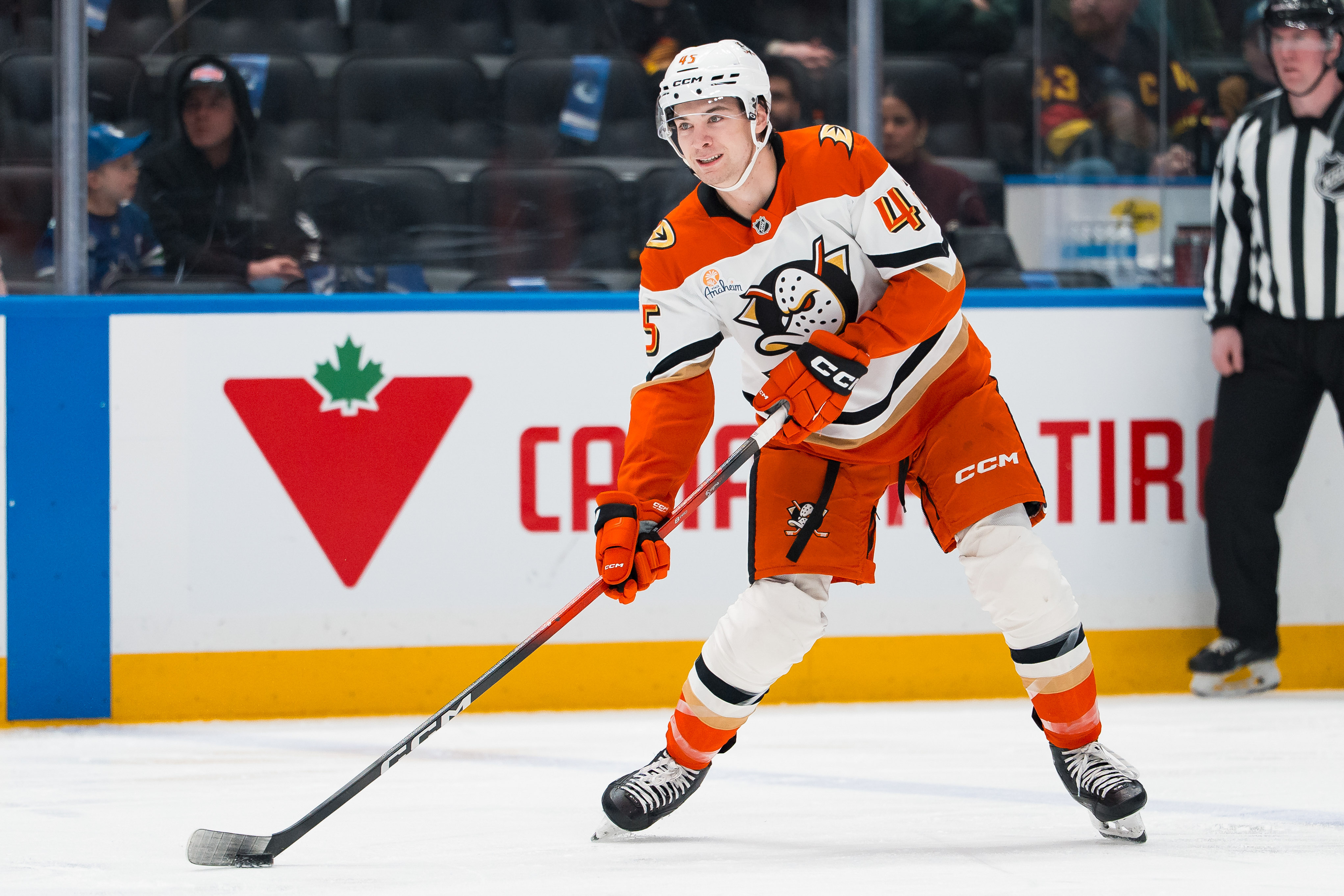 Anaheim Ducks forward Beckett Sennecke handles the puck as we make our best Ducks vs. Sharks prediction.