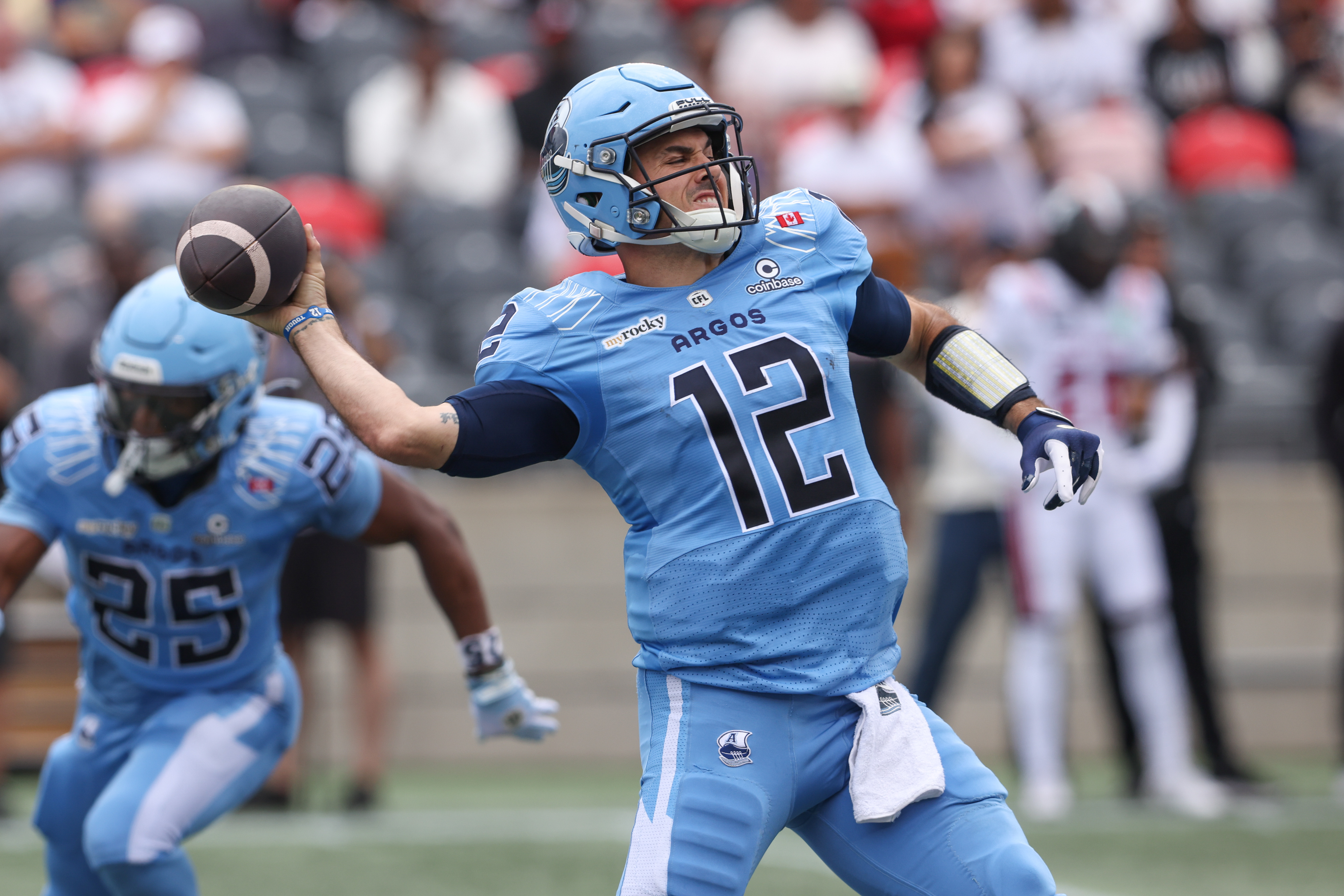 Toronto Argonauts quarterback Chad Kelly (12) throws as we break down our Argonauts vs. Tiger-Cats prediction.