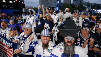Dallas Cowboys fans react to their team's selection in the second round of the 2023 NFL Draft.