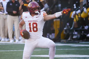 Iowa State’s Benjamin Brahmer points forward after getting a first down as we look at Iowa's sports betting and casino financials for August 2024.