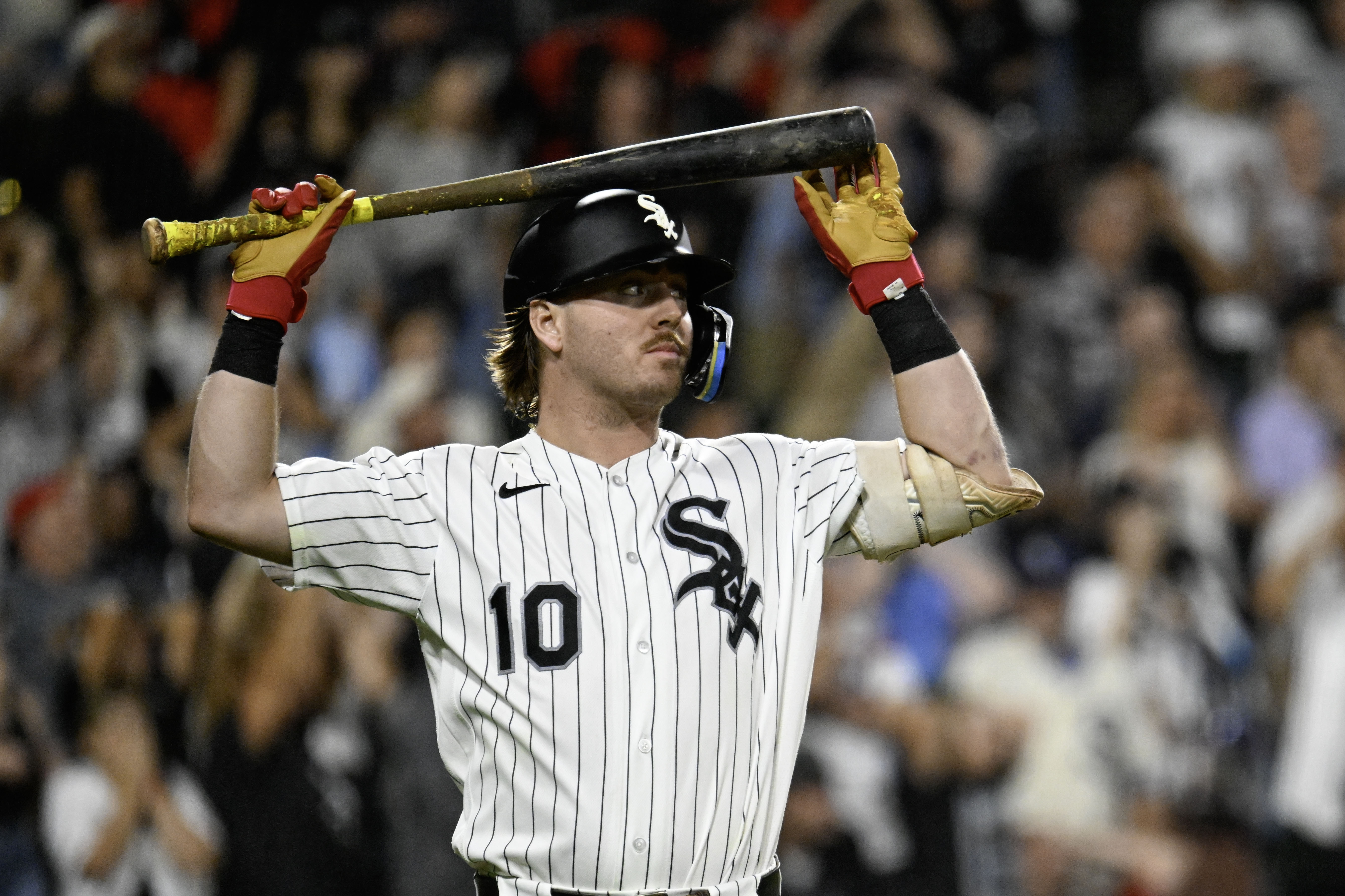 Chicago White Sox second baseman Chase Meidroth (10) holds his bat as we break down our White Sox vs. Guardians prediction.