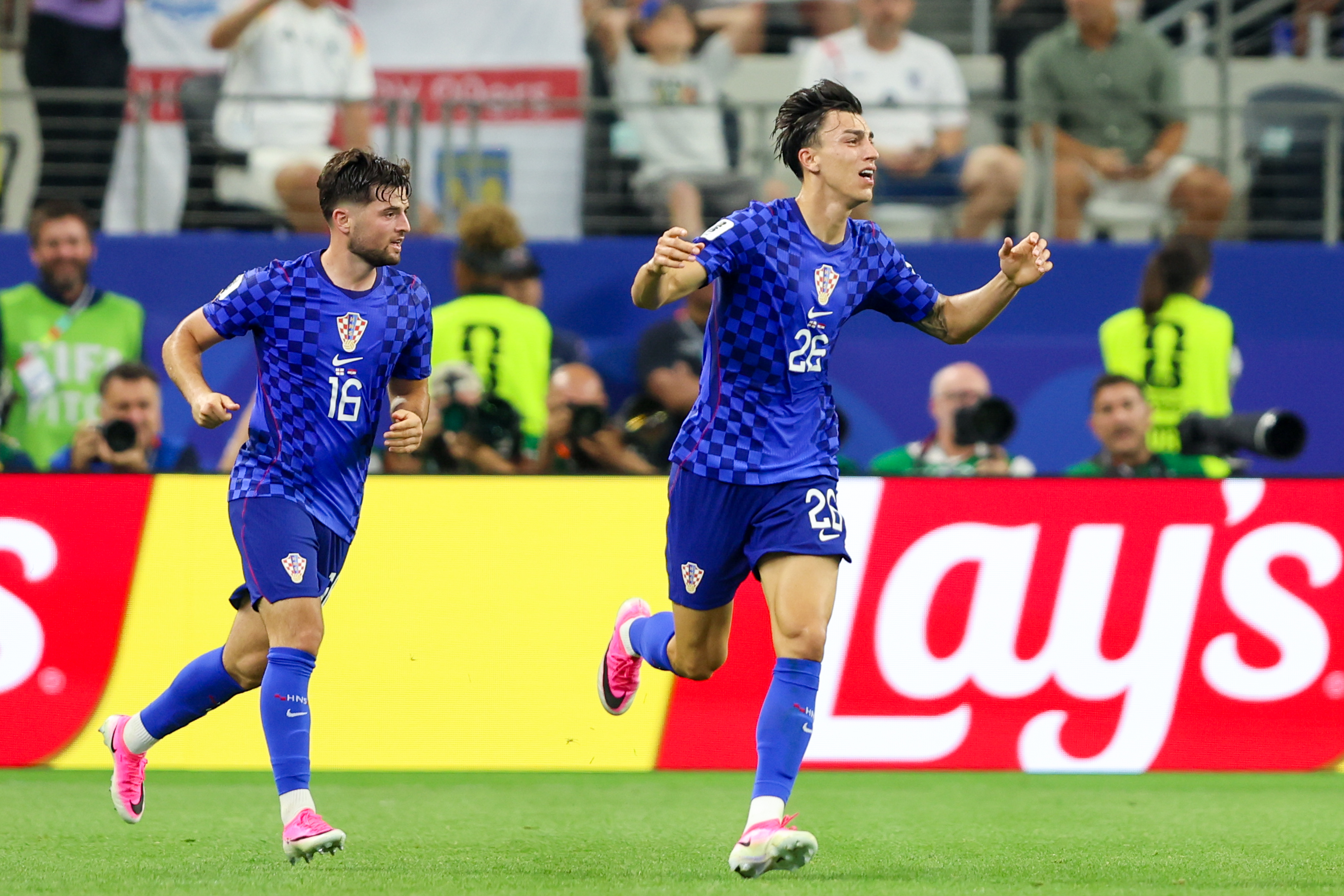 Martin Baturina and Petar Musa of Croatia celebrate as we make our best Panama vs. Croatia prediction.