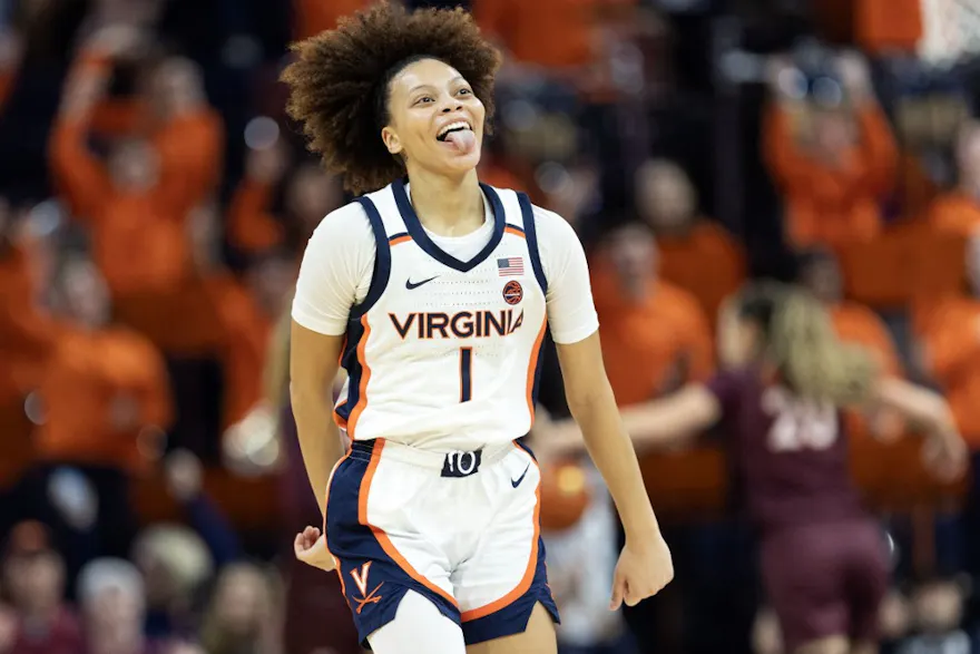 Paris Clark #1 of the Virginia Cavaliers celebrates a shot in the first half as we look at the details surrounding the handle and revenue figures for Virginia's legal sports betting scene in January 2024.