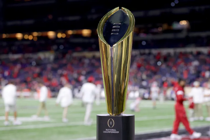The National Championship Trophy is seen on the field prior to the 2022 CFP National Championship Game between the Alabama Crimson Tide and Georgia Bulldogs at Lucas Oil Stadium on Jan. 10. 