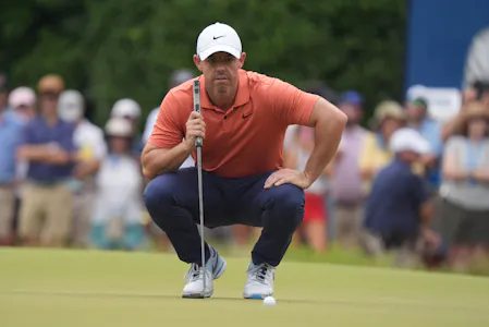 Rory McIlroy prepares to putt as we look at the U.S. Open Round 2 odds and our top picks for Friday at Pinehurst No. 2