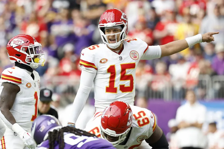 Patrick Mahomes of the Kansas City Chiefs calls a play during the first quarter against the Minnesota Vikings as we look at our NFL Week 13 parlay picks.
