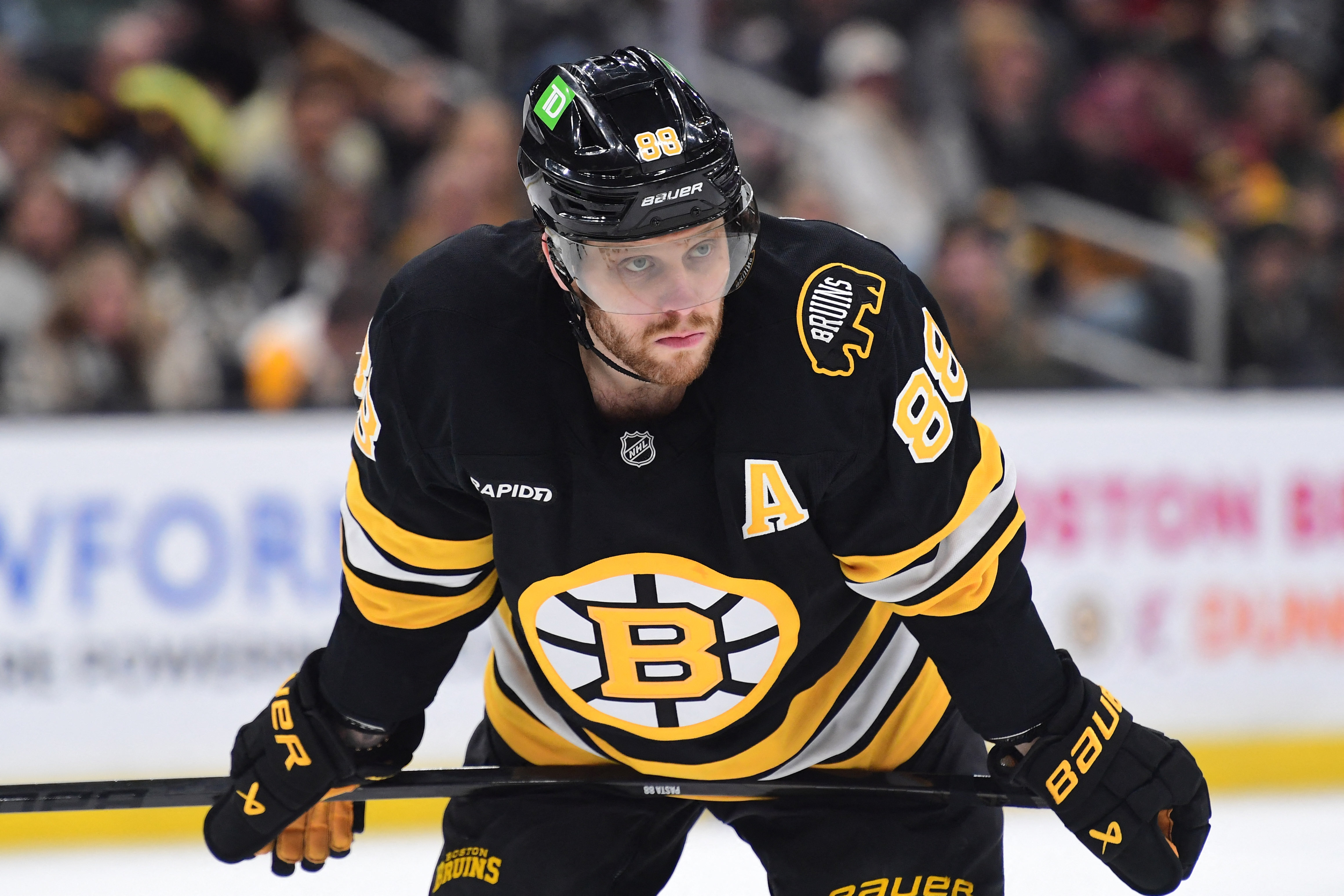 Boston Bruins right wing David Pastrnak - who's featured in our anytime goal scorer predictions - gets set for a face-off. 
