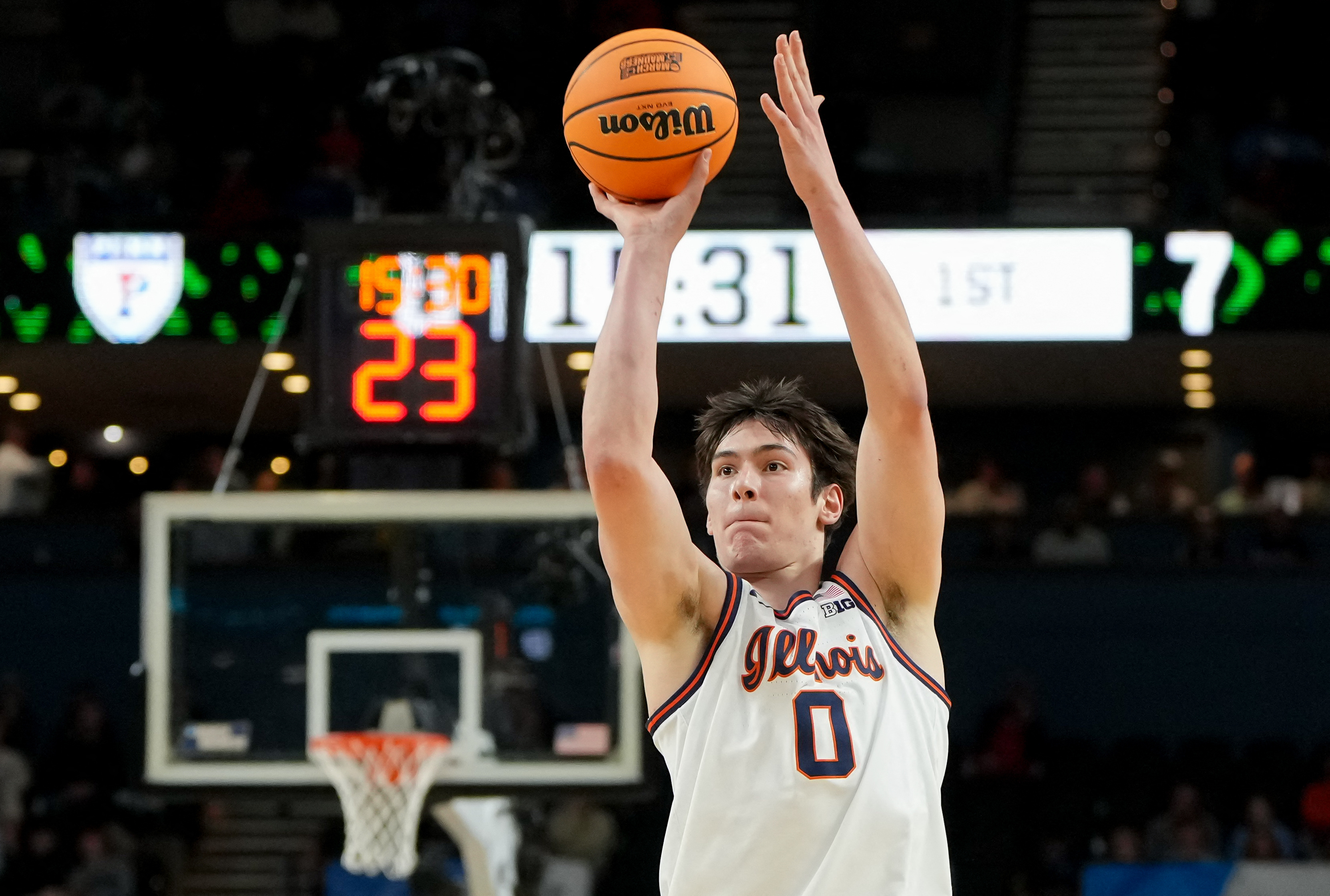 Illinois Fighting Illini forward David Mirkovic (0) shoots the ball as he is featured in our Illinois vs Houston prediction.