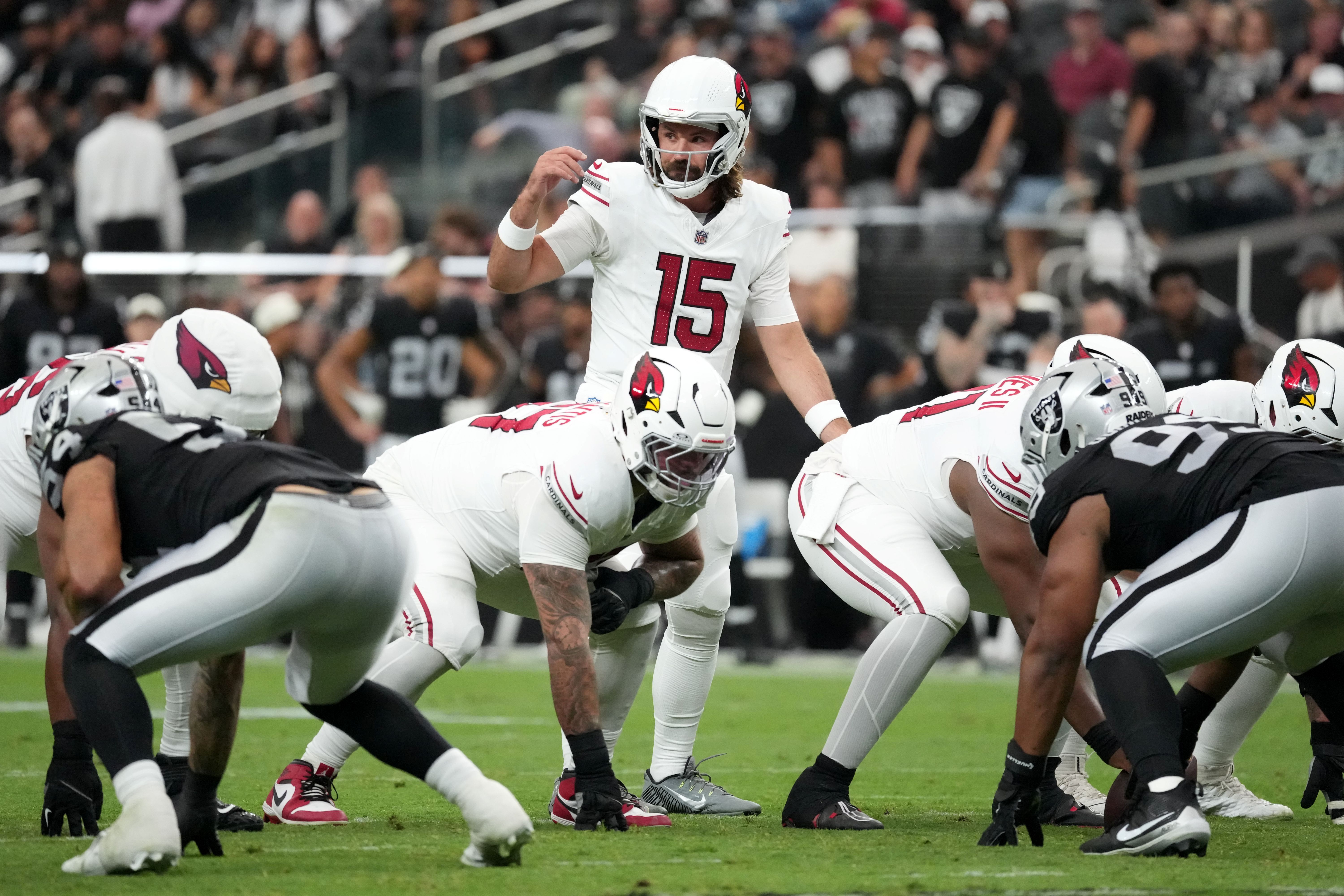 Arizona Cardinals quarterback Gardner Minshew II (15) takes a snap as we break down our Cowboys vs. Cardinals prediction.