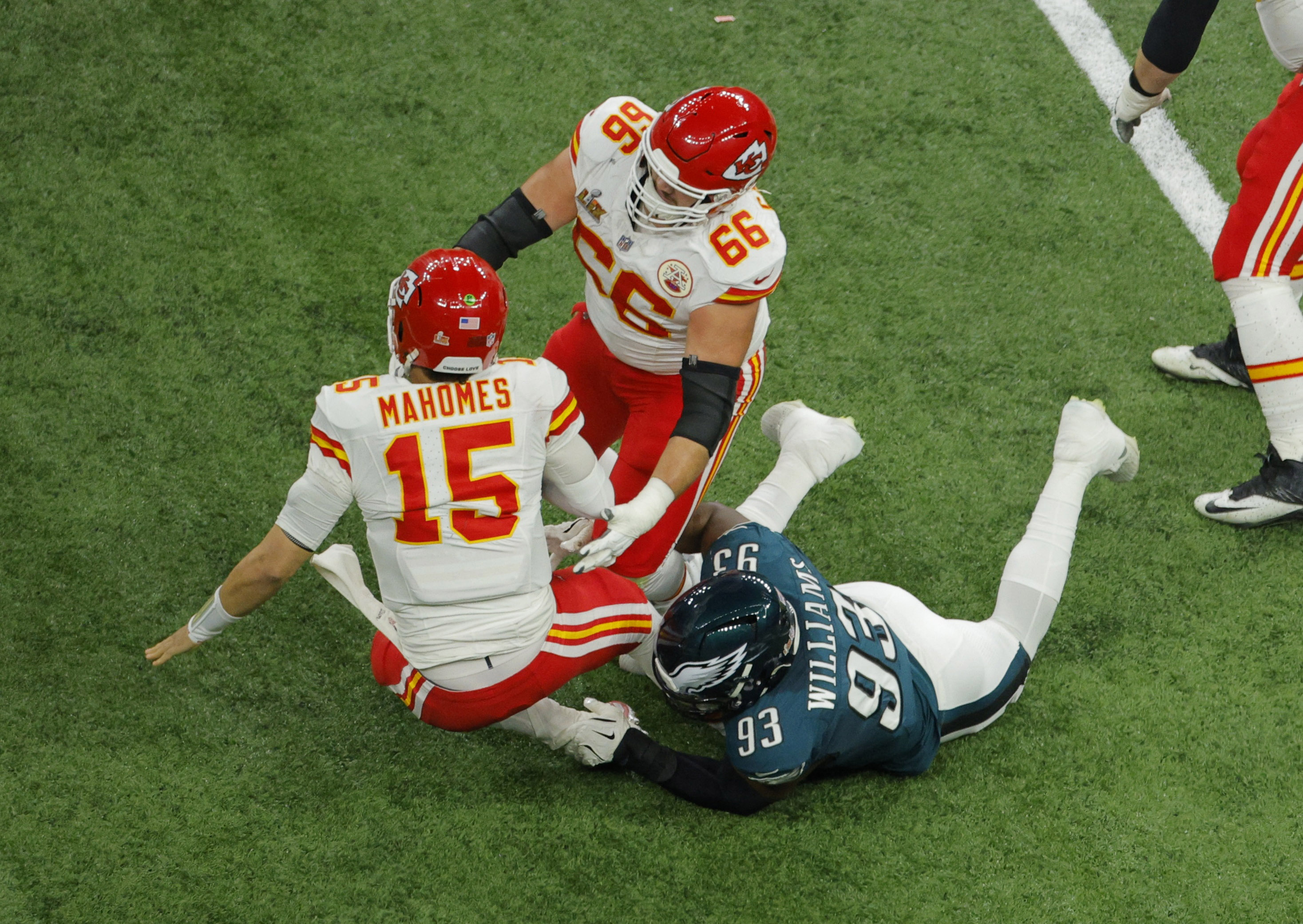 Kansas City Chiefs' Patrick Mahomes is sacked by Philadelphia Eagles' Milton Williams as we look at Super Bowl sack odds.