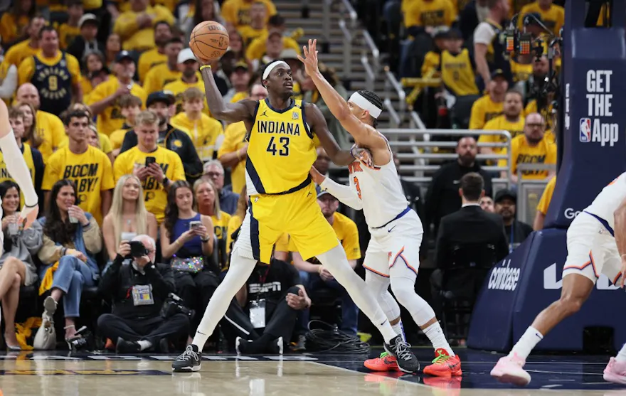 Pascal Siakam of the Indiana Pacers passes the ball while defended by Josh Hart of the New York Knicks in Game 3.  We're backing Siakam in our Pacers vs. Knicks Player Props. 