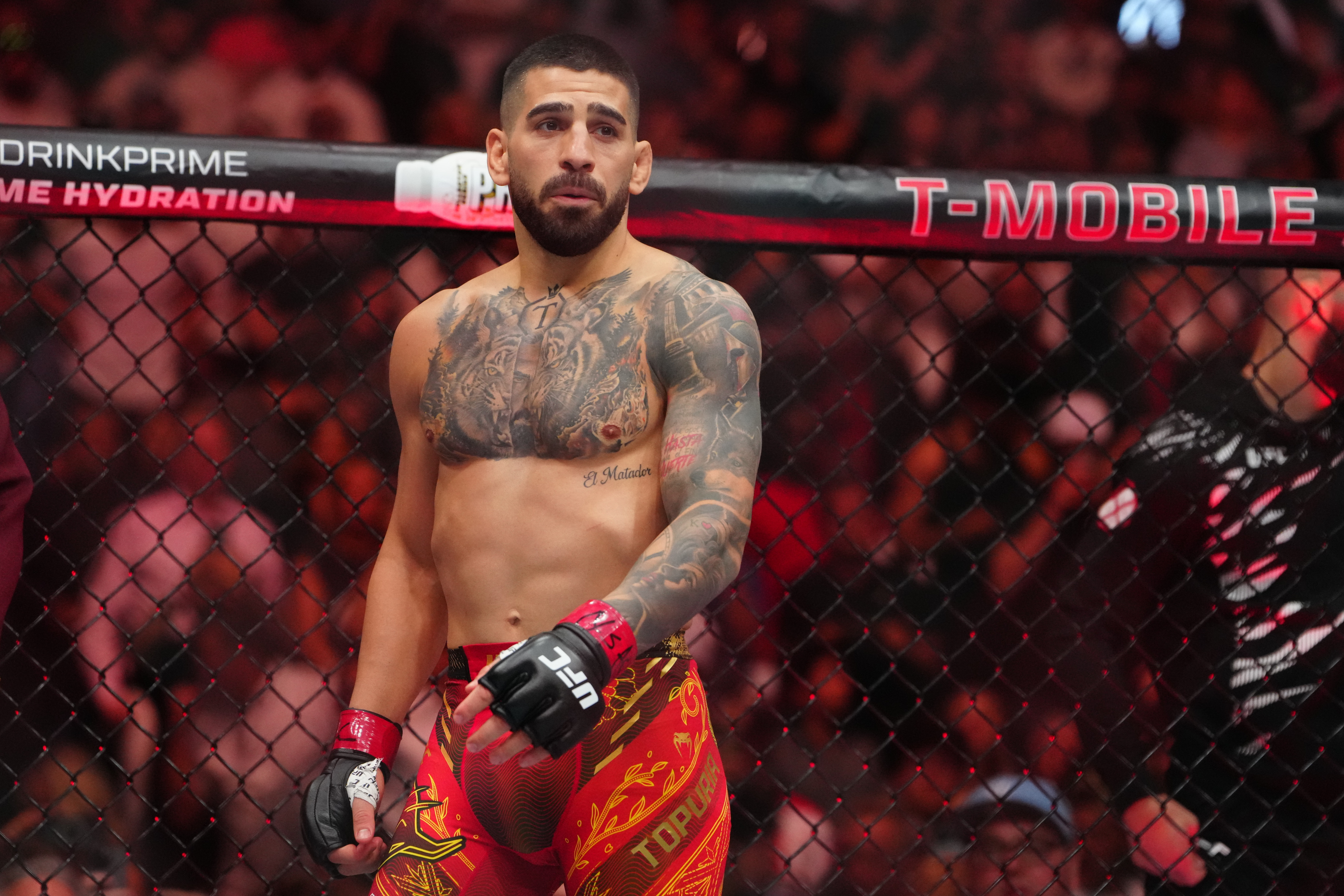Ilia Topuria (red gloves) prior to the fight as he is featured in our Ilia Topuria vs. Justin Gaethje prediction.