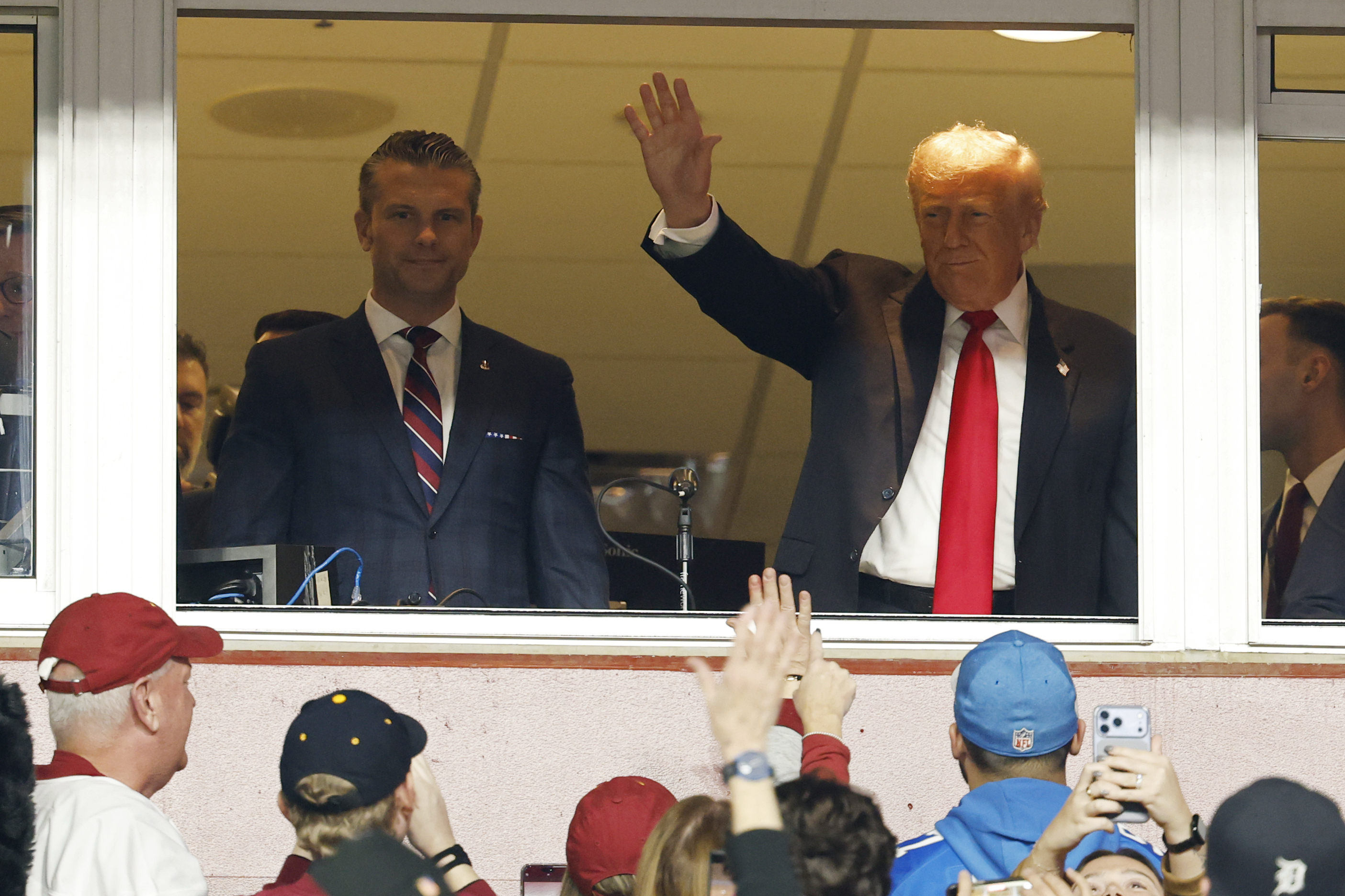 President Donald Trump waves to fans as we look at the increase in celebrity and pop culture betting on prediction market apps