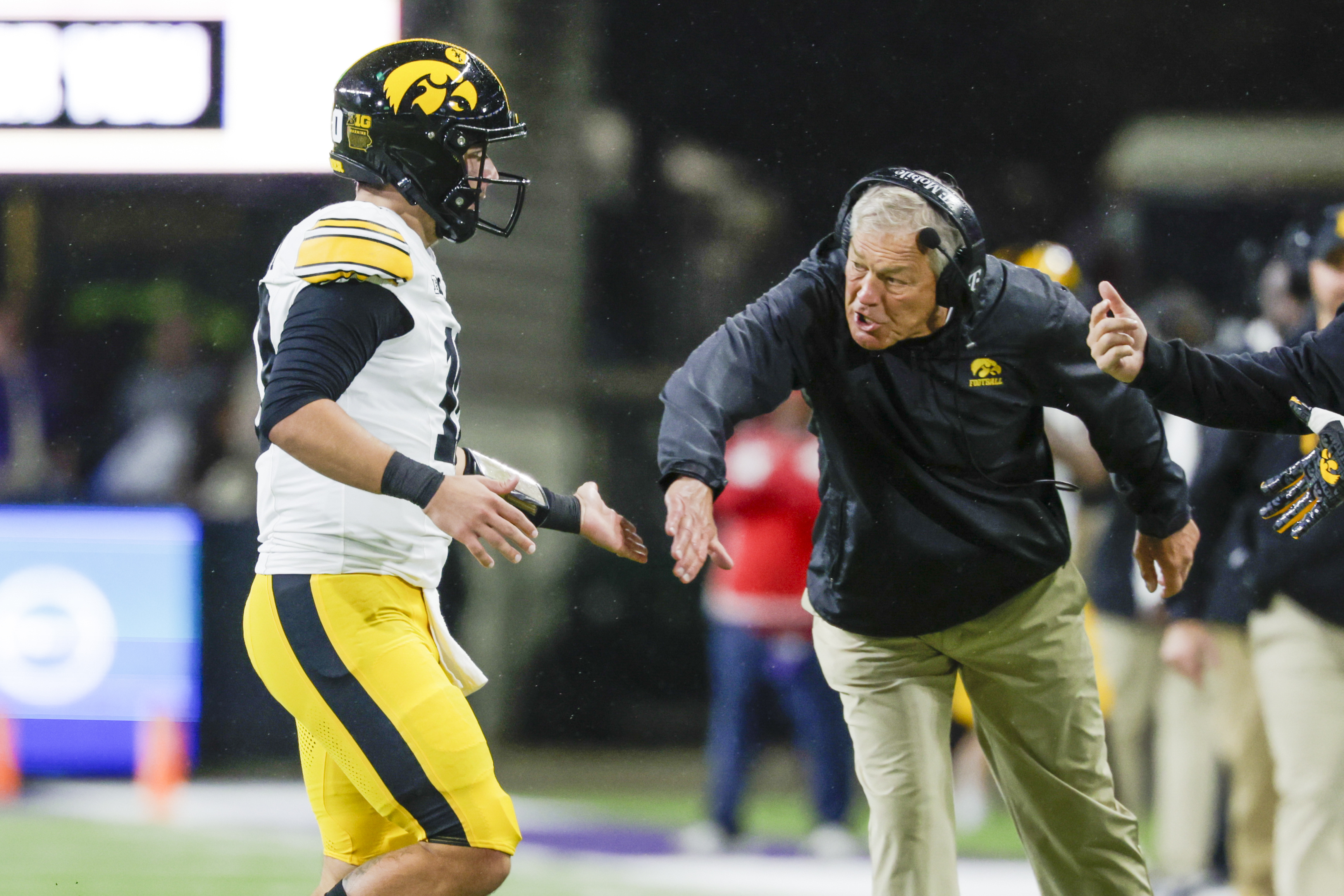  Iowa Hawkeyes head coach Kirk Ferentz reacts following a touchdown pass by quarterback Jeremy Hecklinski (10) as he is featured in our Iowa vs. Minnesota prediction.