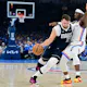 Luka Doncic (77) of the Dallas Mavericks drives to the basket against Luguentz Dort (5) of the Oklahoma City Thunder, as we offer our best Mavericks vs. Thunder player props for Game 2 on Thursday at Paycom Center in Oklahoma City.