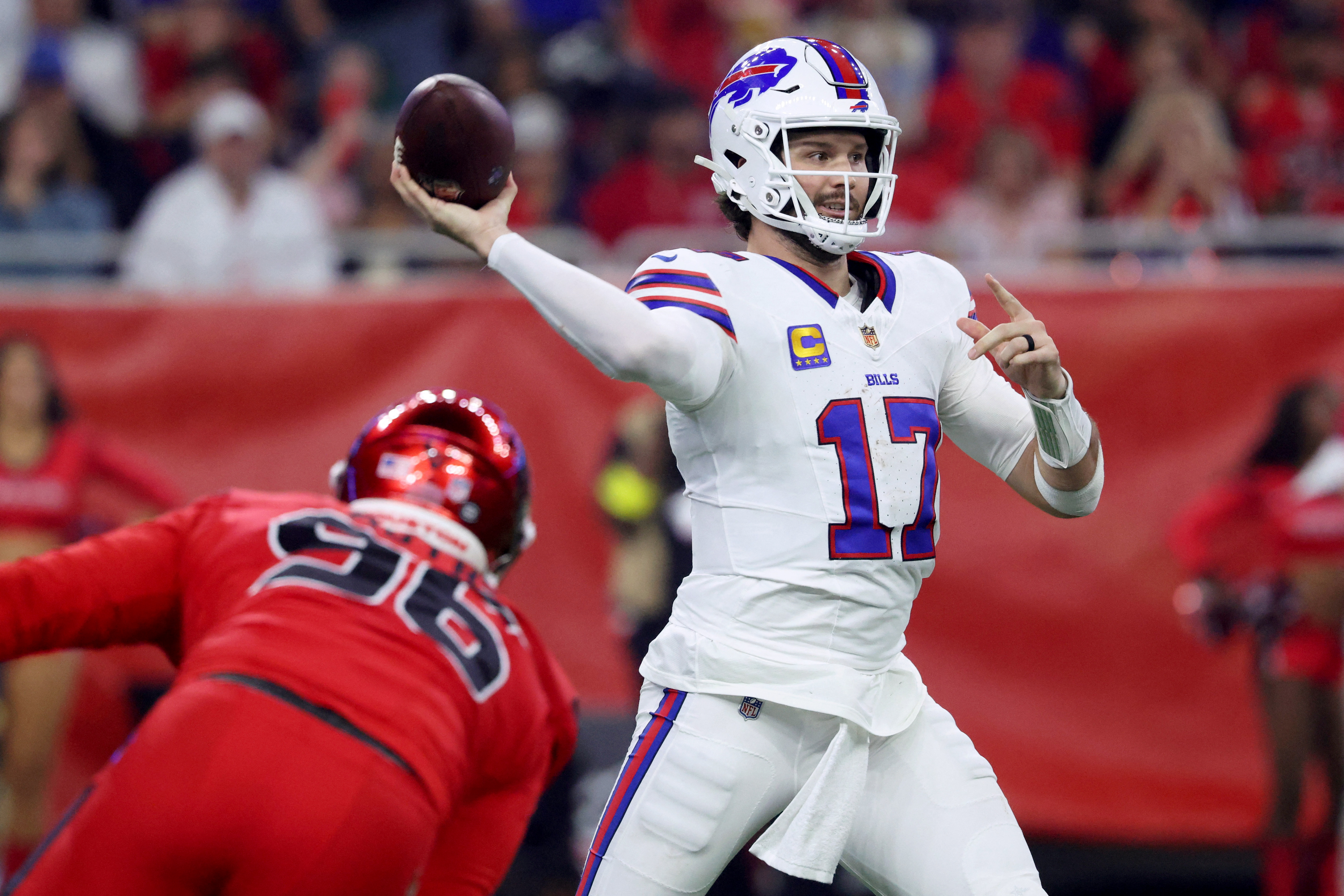 Buffalo Bills quarterback Josh Allen (17) throws a pass as we provide our Bills vs. Texans prediction.
