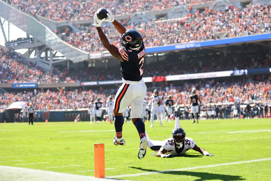 DJ Moore of the Chicago Bears scores a touchdown against the Denver Broncos, as we look at the top Bears vs. Vikings player props.