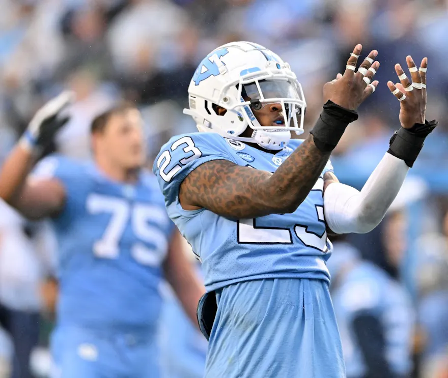 Power Echols of the North Carolina Tar Heels signals the start of the fourth quarter during their game against the Virginia Tech Hokies at Kenan Memorial Stadium on October 01, 2022 in Chapel Hill, North Carolina.