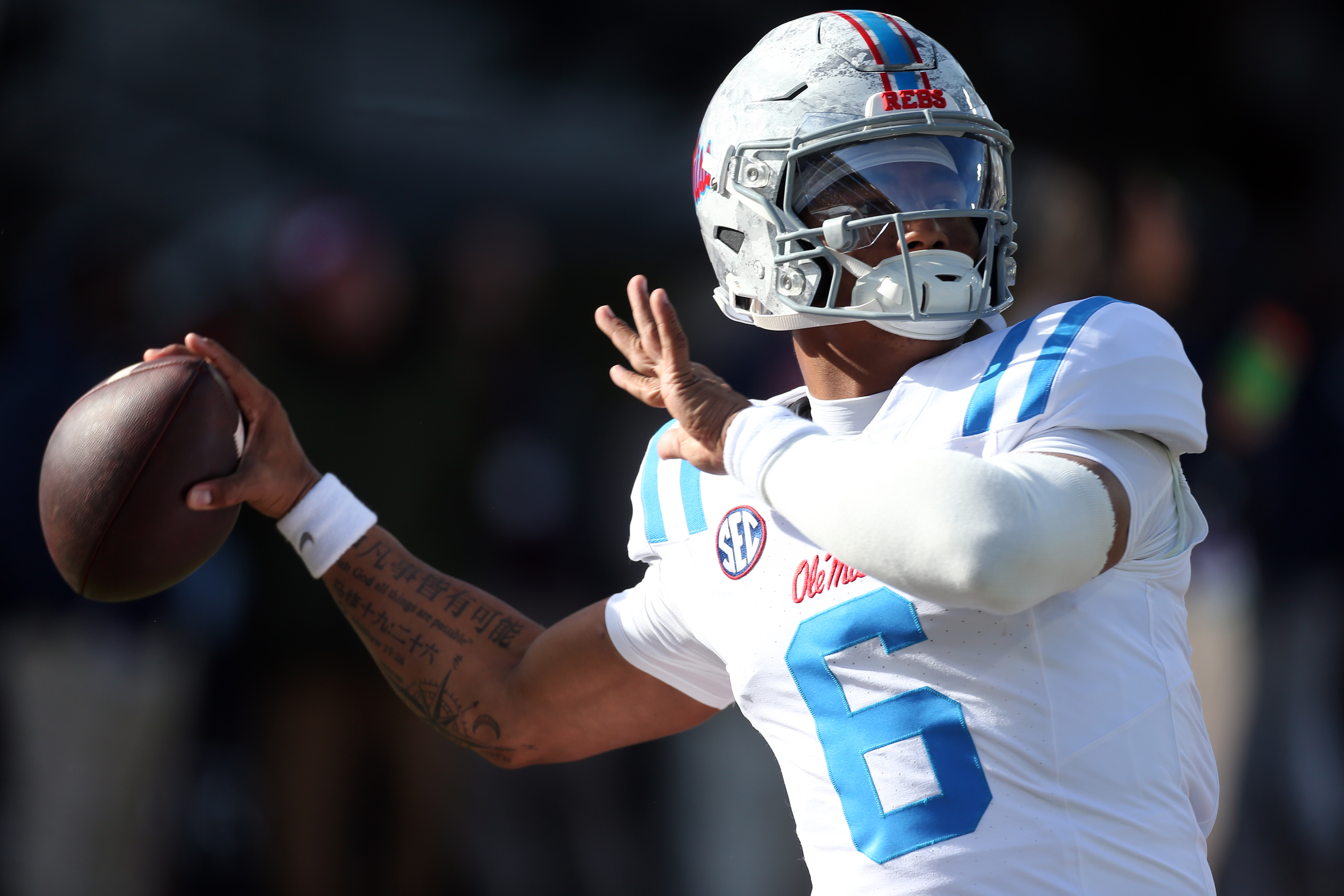 Mississippi Rebels quarterback Trinidad Chambliss (6) warms up as part of our Tulane vs. Ole Miss player props.