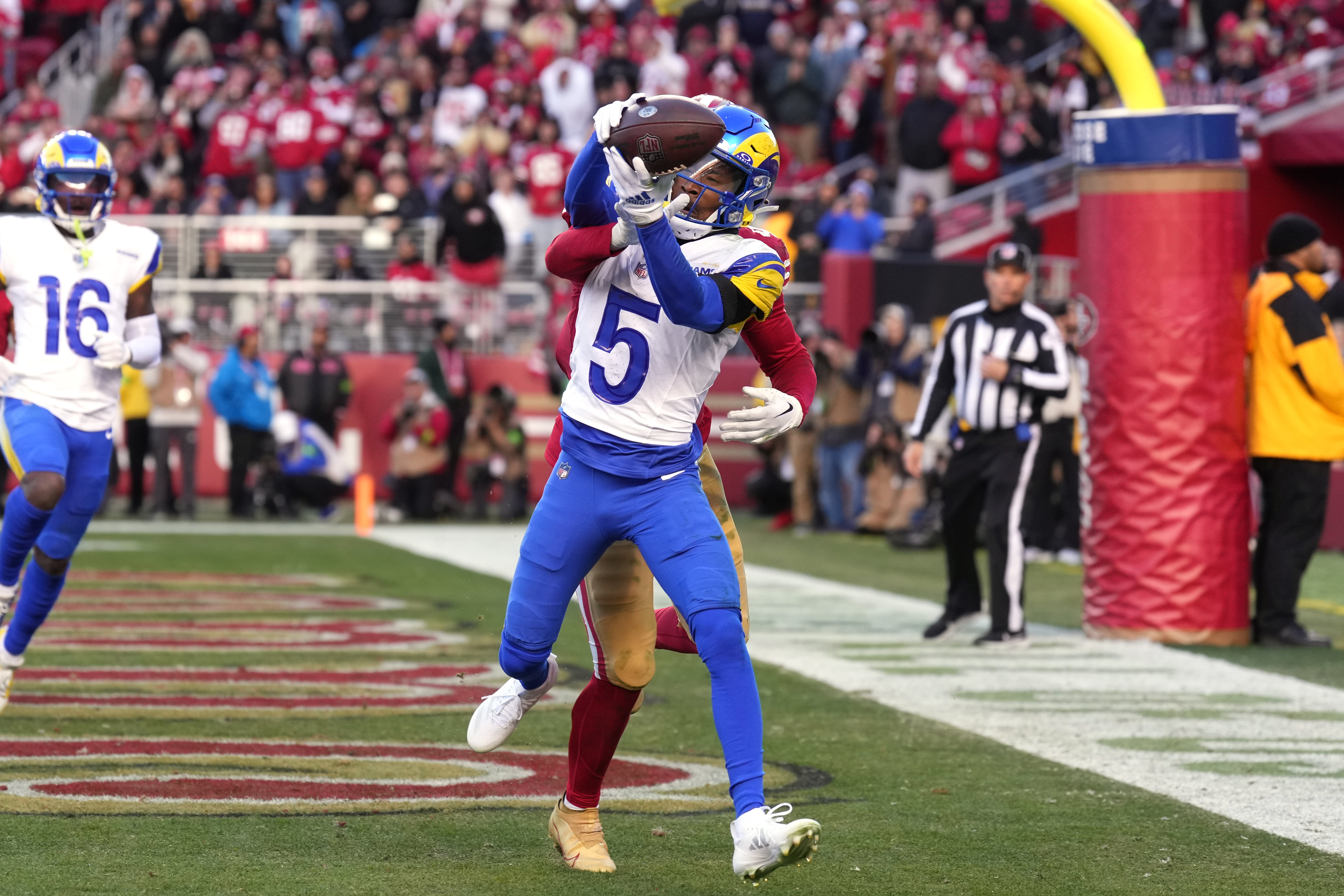 Los Angeles Rams wide receiver Tutu Atwell catches a pass.