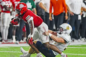 Jax State's Cam Cook tries to evade the tackle as we look at our college football player props and anytime touchdown scorer predictions