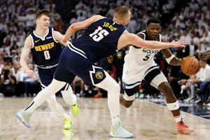 Anthony Edwards of the Minnesota Timberwolves drives to the basket against Nikola Jokic of the Denver Nuggets during Game 4 of the NBA playoffs. We're backing Edwards in our NBA Player Props & Expert Picks. 