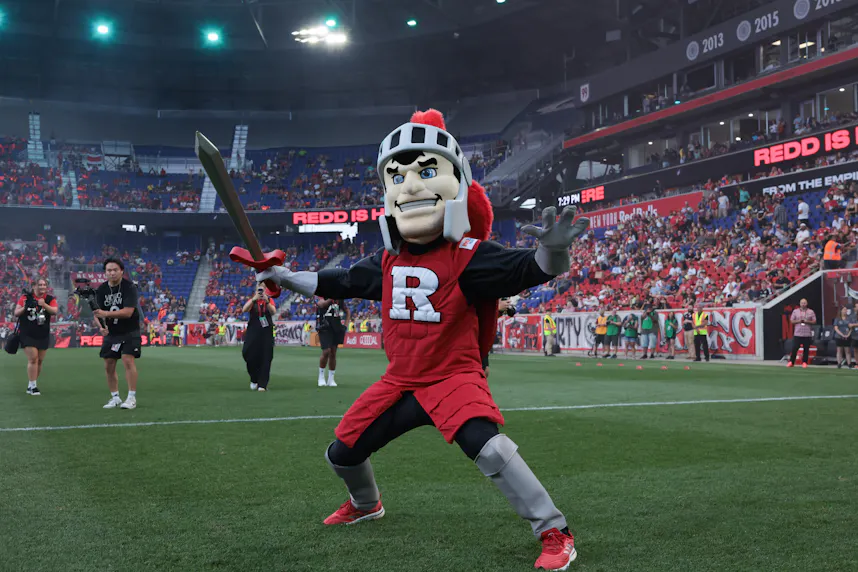 Sir Henry, the Rutgers Scarlet Knight mascot, celebrates as we look at the July sports betting financials for New Jersey.