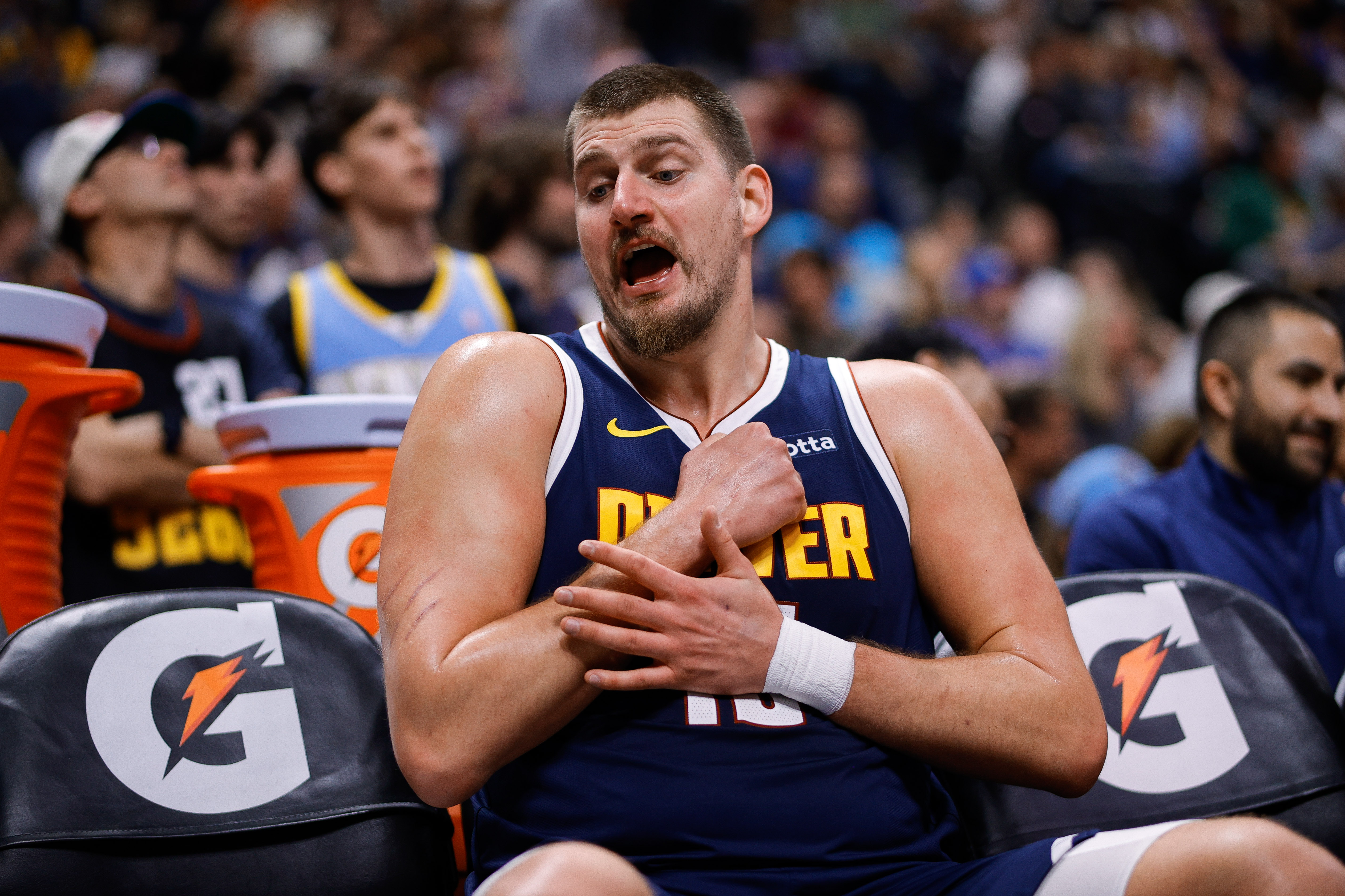 Denver Nuggets center Nikola Jokic (15), seen here on the bench, leads our Nuggets vs. Mavericks player props.