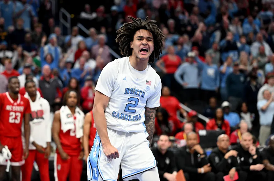 Elliot Cadeau #2 of the North Carolina Tar Heels celebrates as we look at our FanDuel promo code for March Madness