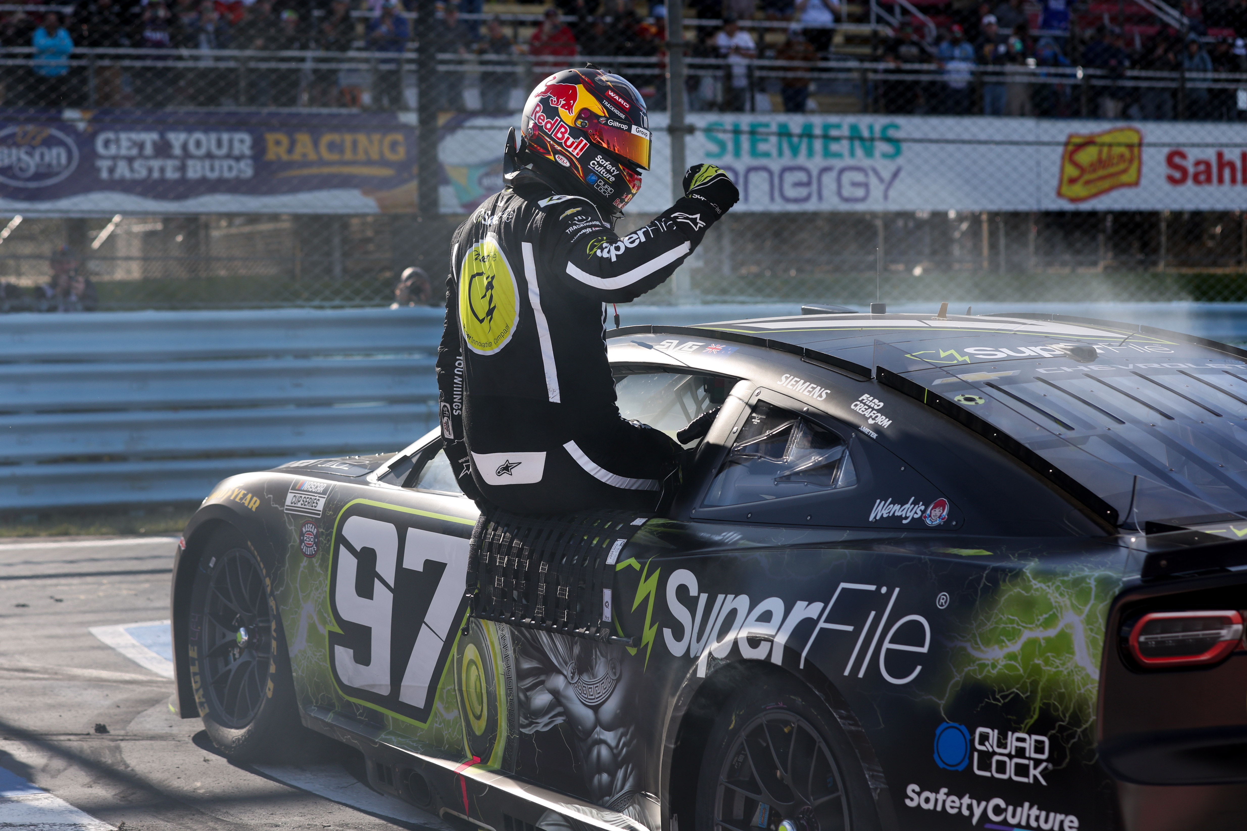 NASCAR Cup Series driver Shane Van Gisbergen celebrates as we break down our NASCAR predictions at Sonoma 2026.