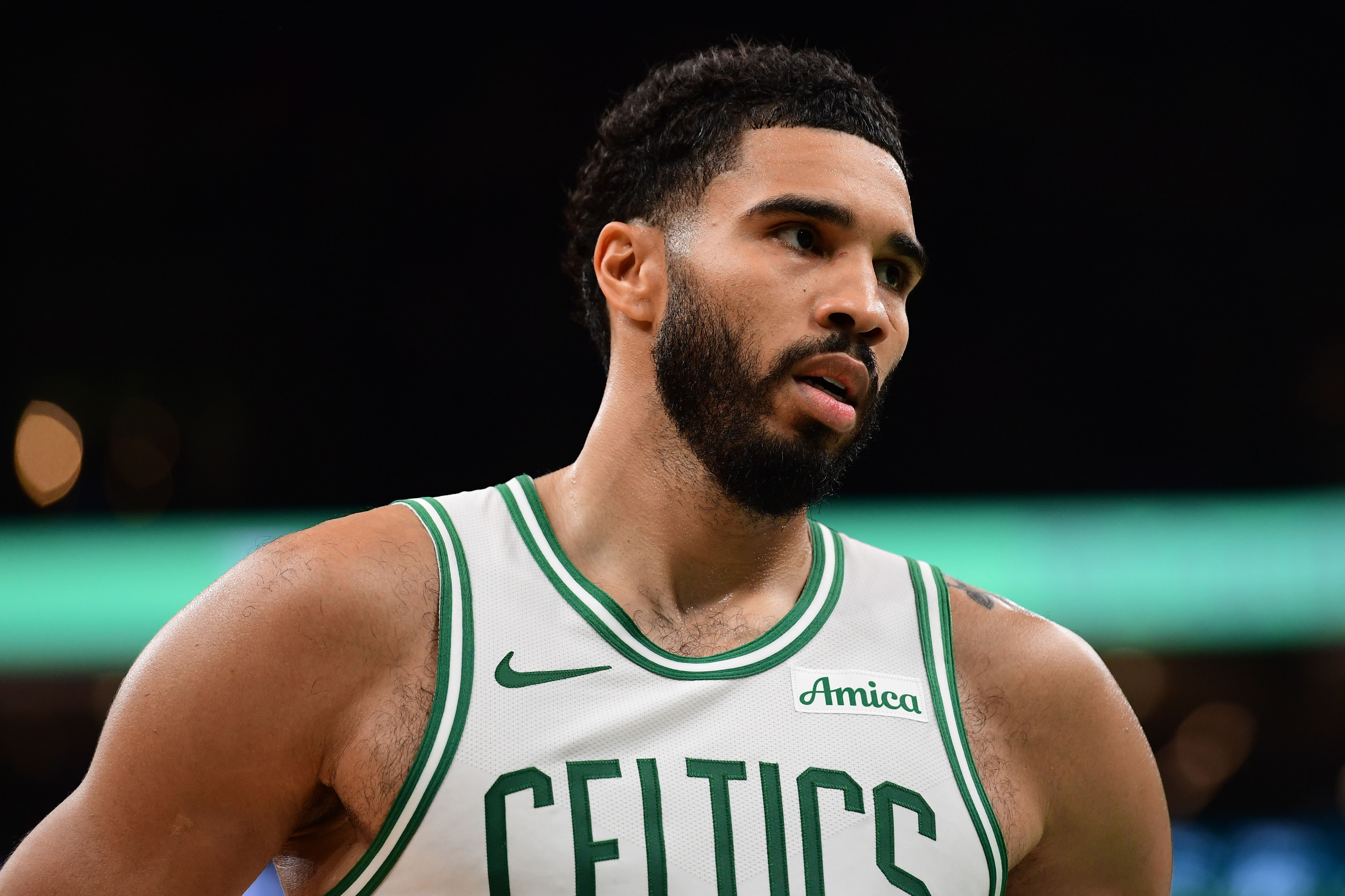 Boston Celtics forward Jayson Tatum (0) looks on as we break down our Knicks vs. Celtics prediction.