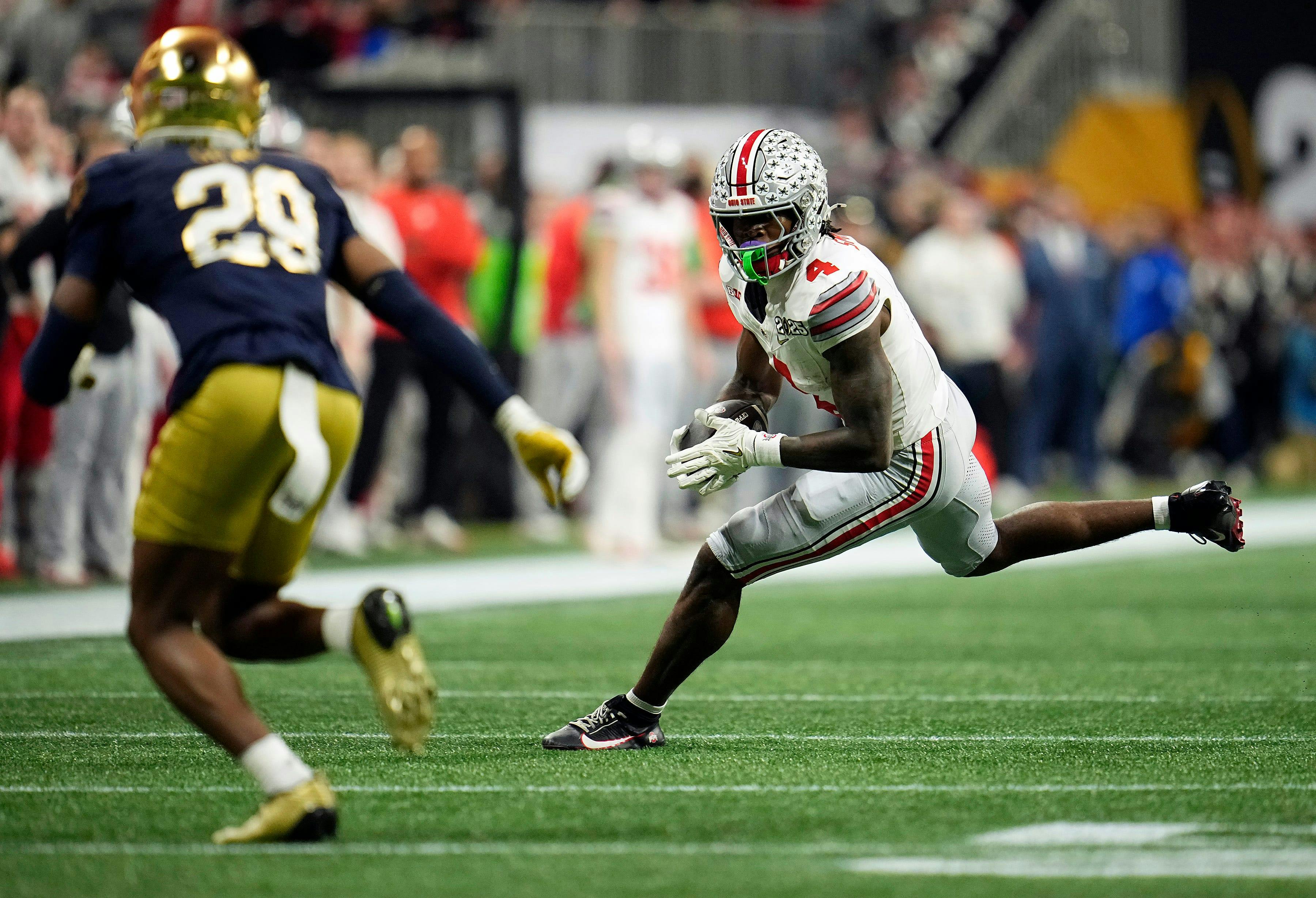 Ohio State Buckeyes wide receiver Jeremiah Smith makes a catch as we analyze the early 2026 college football national championship odds.