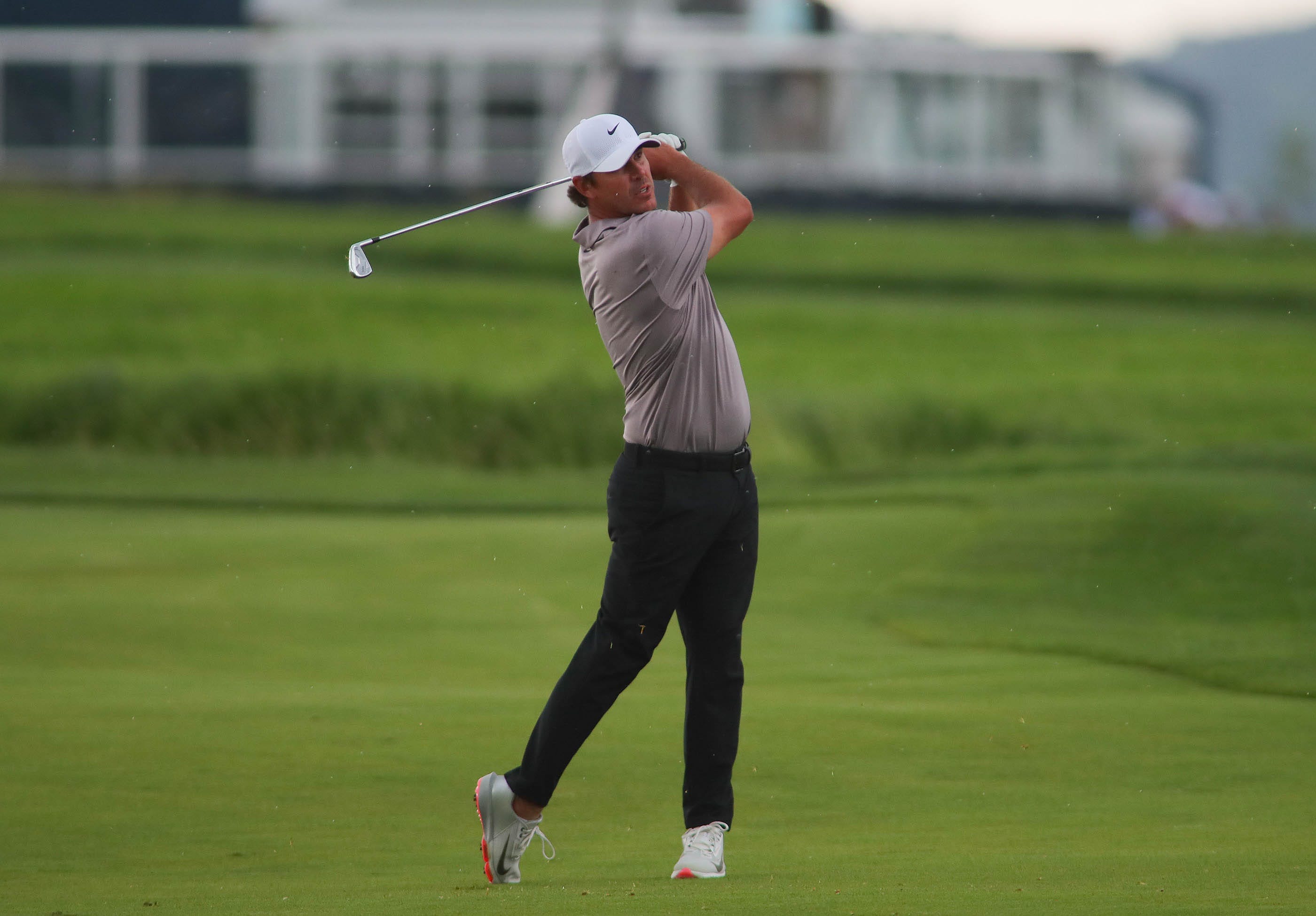 Brooks Koepka - who's featured in my Farmers Insuance Open long shot picks - watches his shot. 