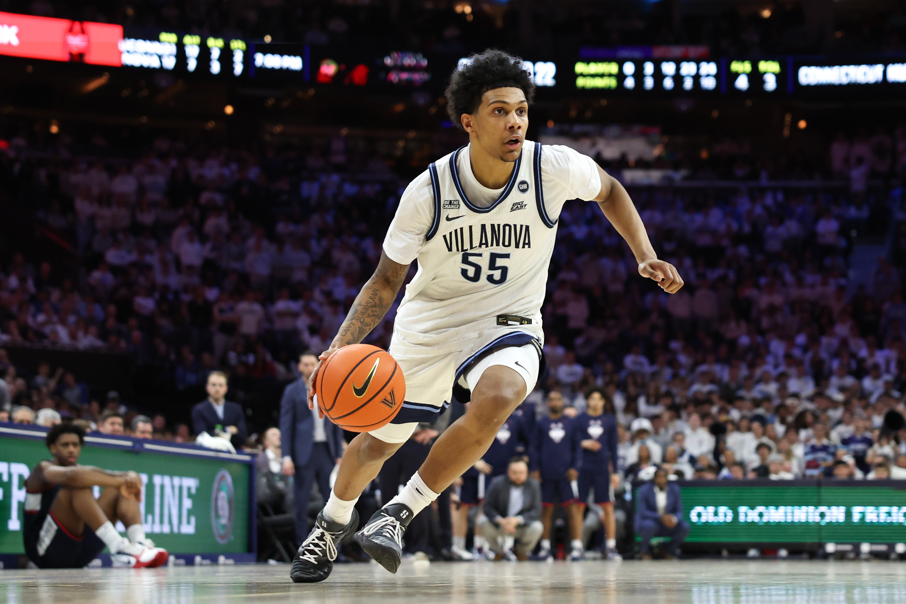 Villanova Wildcats guard Acaden Lewis (55) dribbles the ball as we break down our Utah State vs. Villanova prediction.