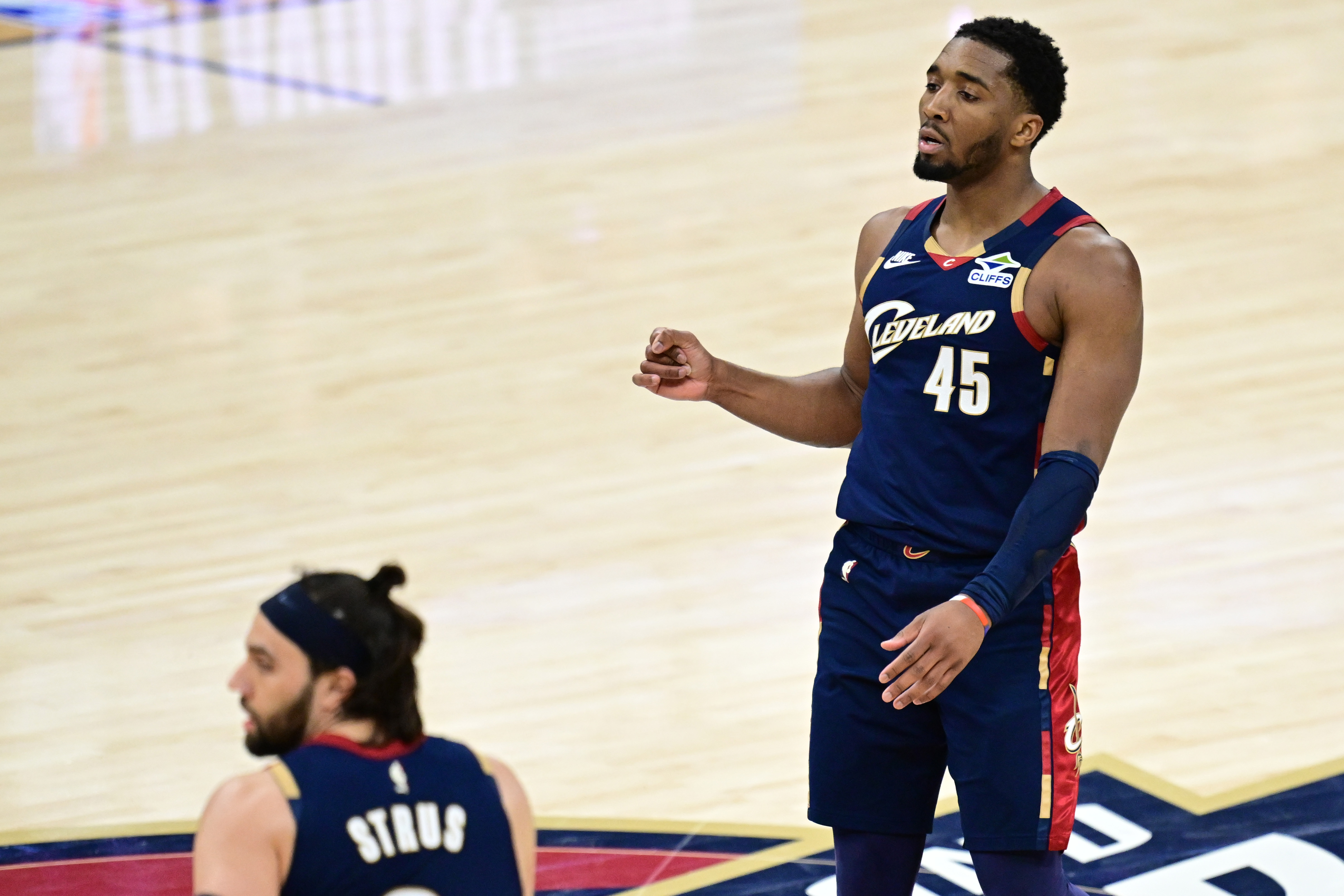 Cleveland Cavaliers guard Donovan Mitchell (45) reacts as we break down our Cavaliers vs. Raptors player props today.