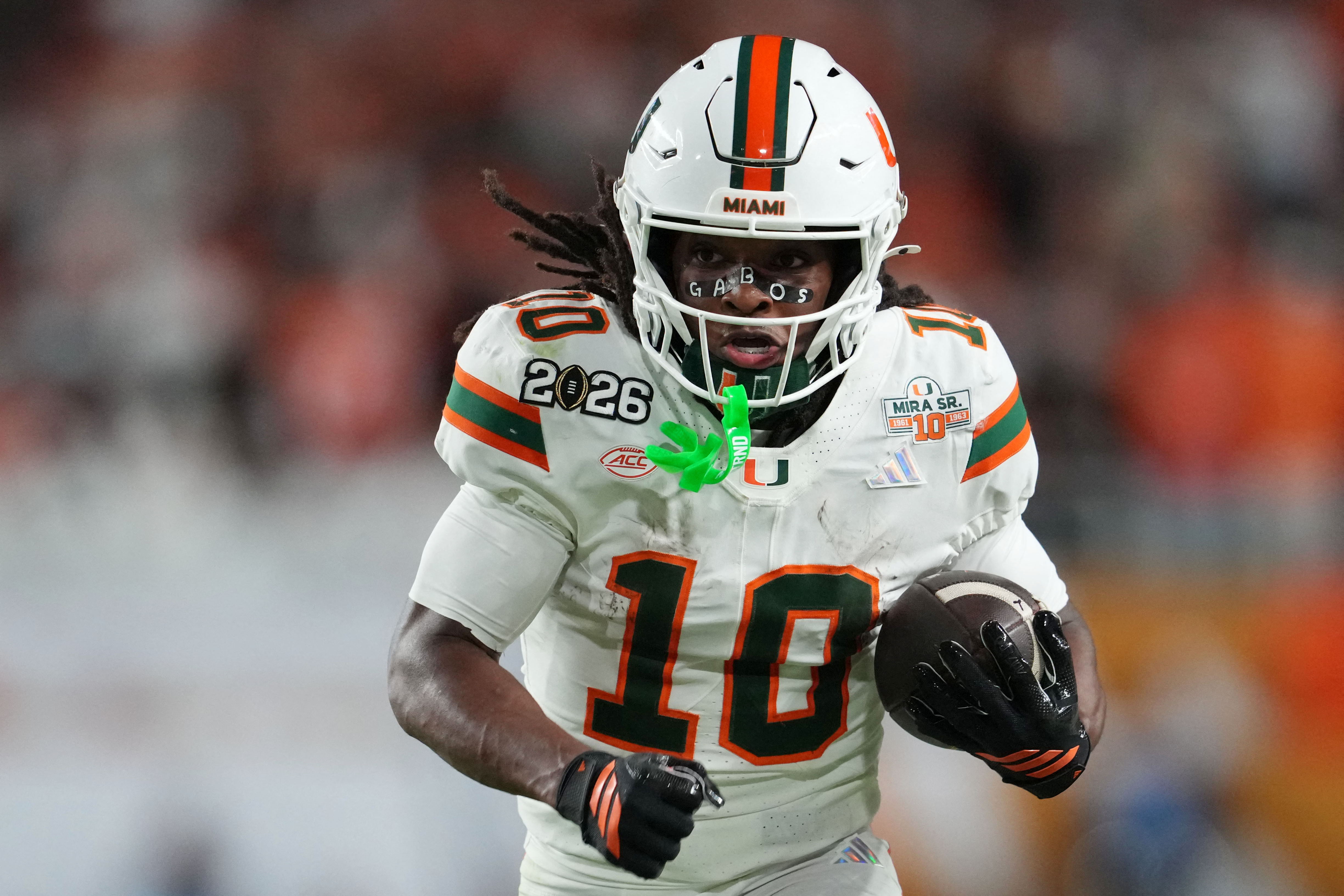 Miami Hurricanes wide receiver Malachi Toney (10) runs with the ball as we break down our Miami vs. Stanford prediction.