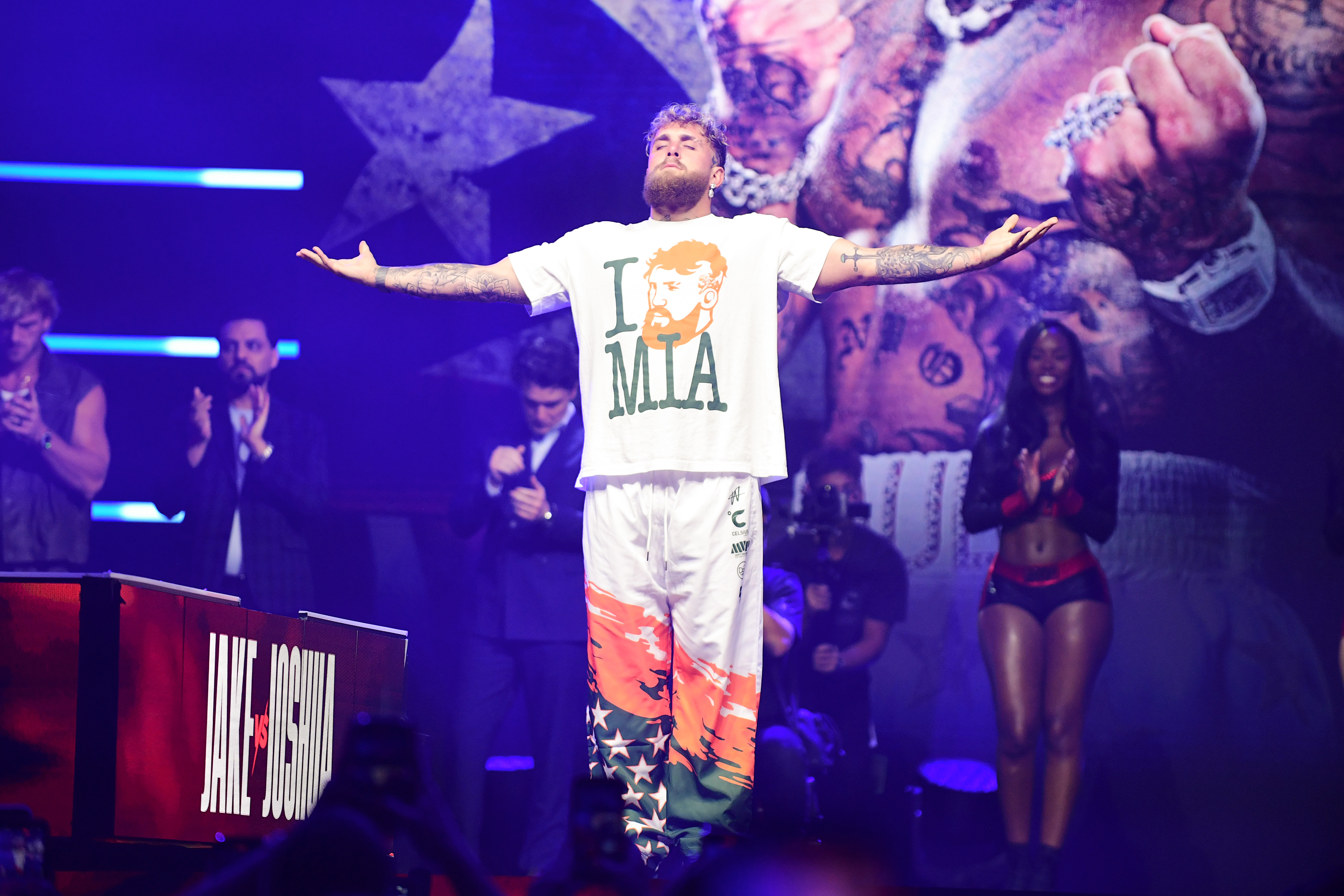 Jake Paul raises his arms prior to the weigh-in as we look at the Jake Paul vs. Anthony Joshua novelty picks