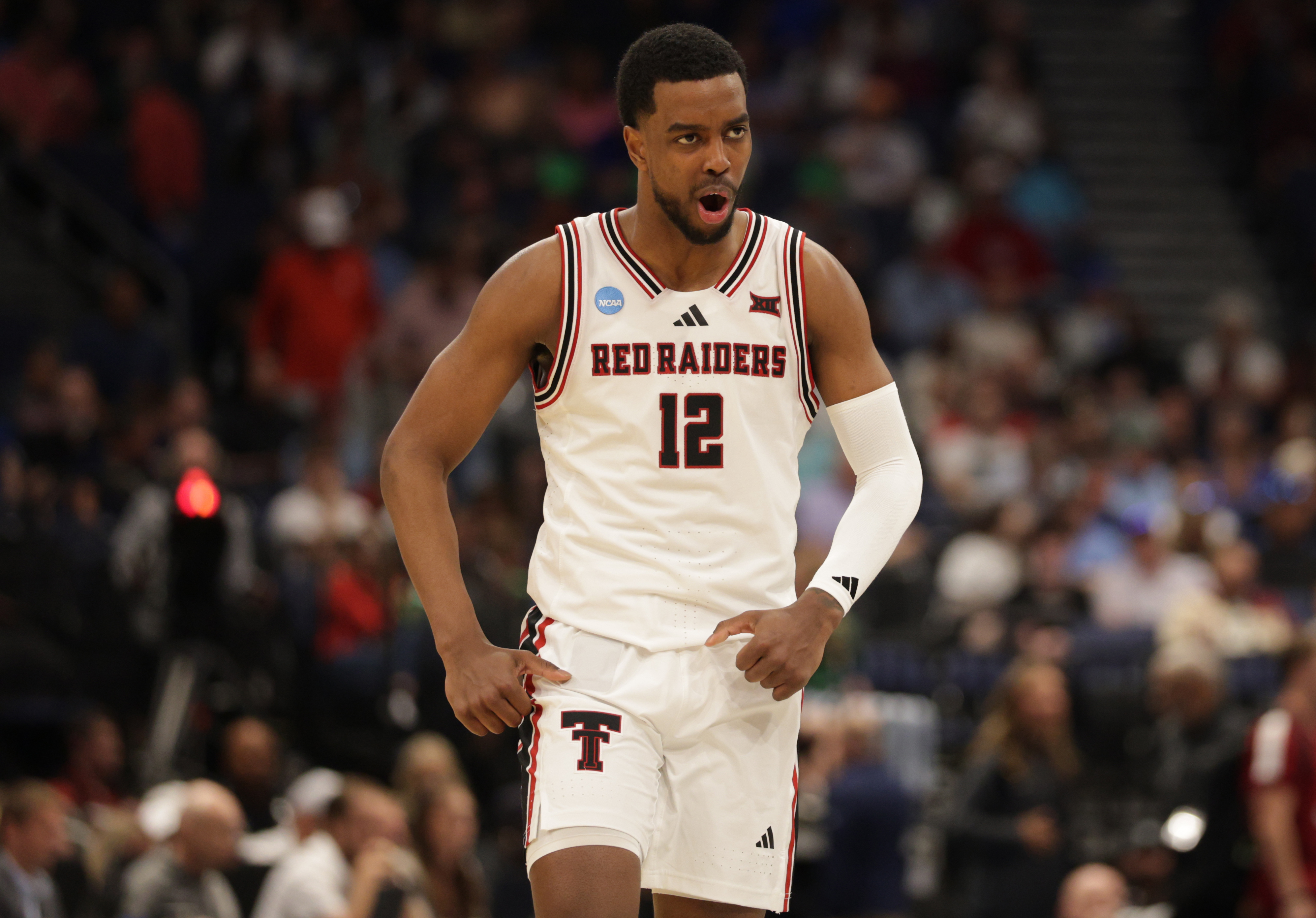 Texas Tech Red Raiders forward Donovan Atwell (12), seen here celebrating, is featured in our Texas Tech vs. Alabama prediction.