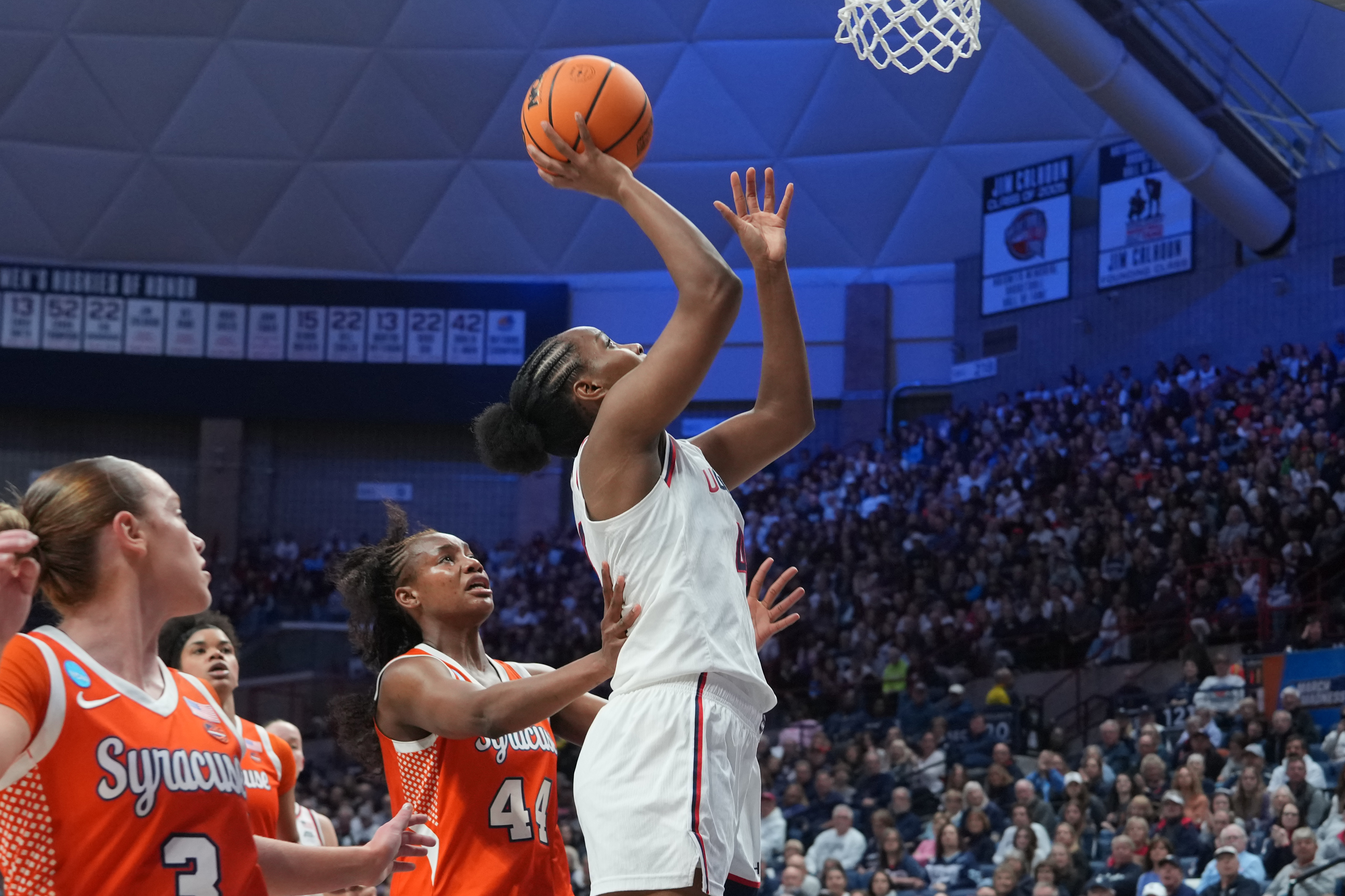 UConn Huskies forward Blanca Quinonez (4) shoots a layup as she is featured in our North Carolina vs. UConn prediction & picks.