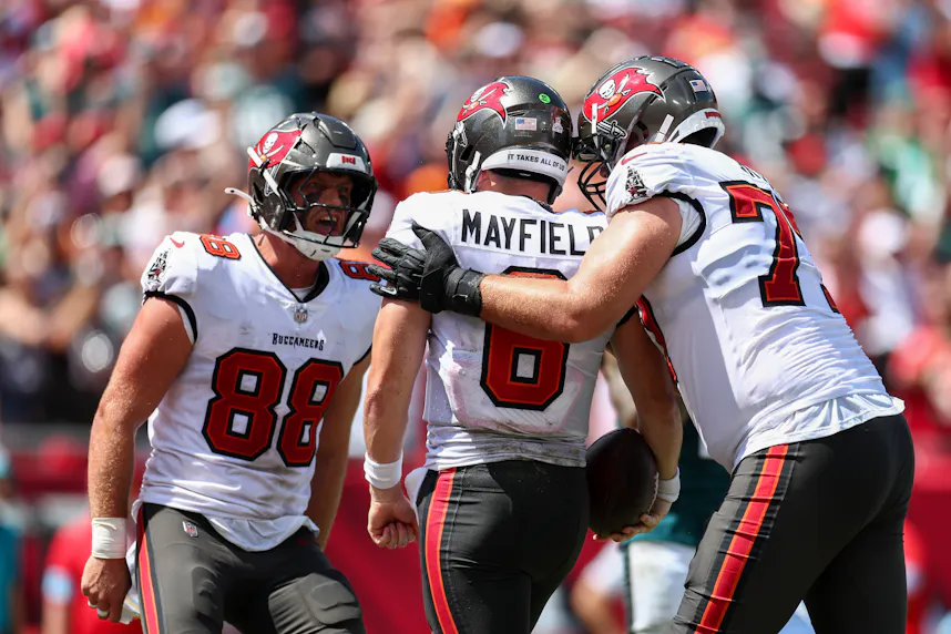 Tampa Bay Buccaneers tight end Cade Otton (88) congratulates as we offer our Buccaneers vs. Chiefs player prop bets for Monday Night Football tonight to conclude NFL Week 9.