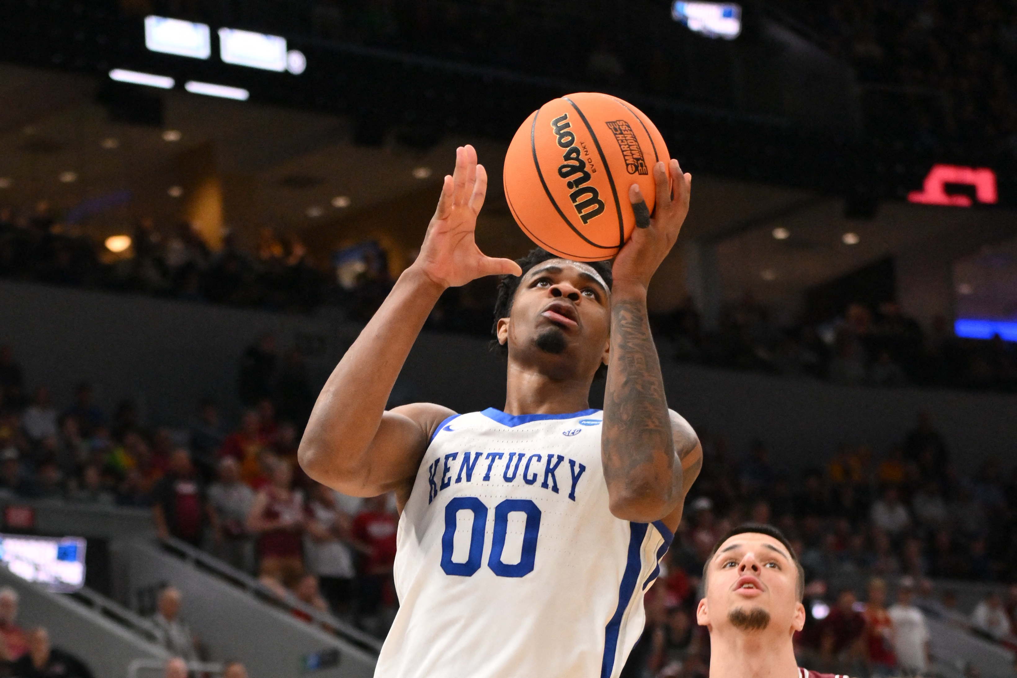 Kentucky Wildcats guard Otega Oweh (00) shoots the ball as he is featured in our Kentucky vs. Iowa State prediction & picks.
