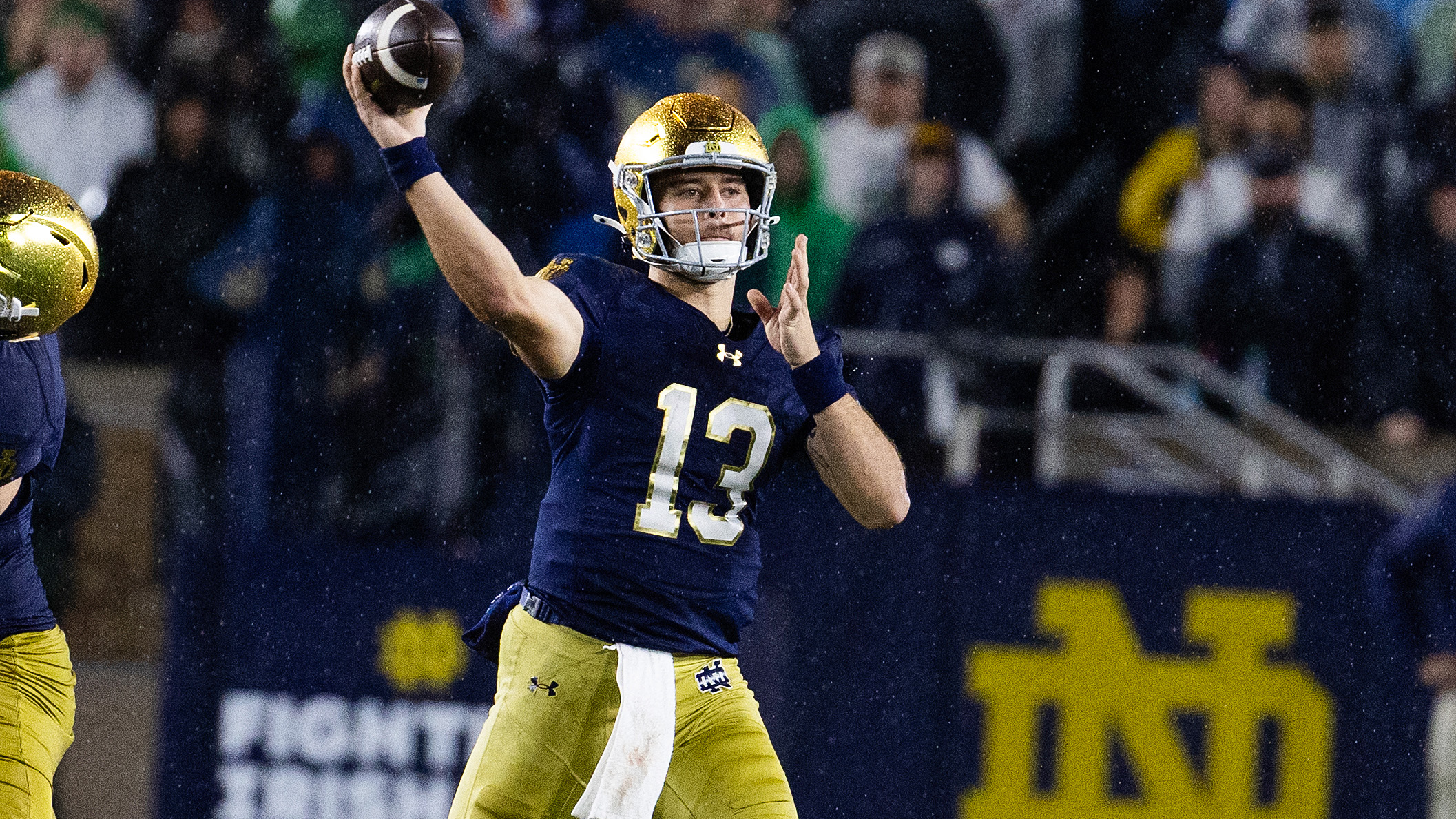 Notre Dame Fighting Irish quarterback CJ Carr (13) drops back to pass the ball in the second half against the Southern California Trojans at Notre Dame Stadium.