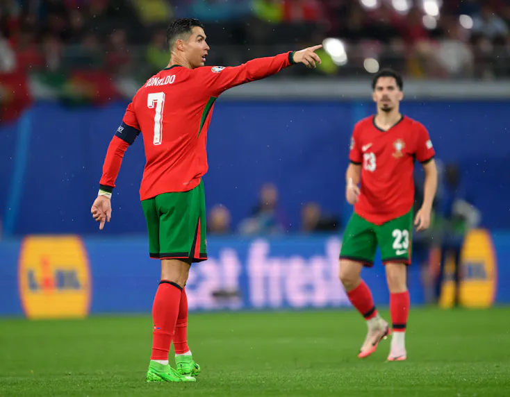 Portugal's Cristiano Ronaldo gestures as we offer our best Turkey vs. Portugal prediction and expert picks for Euro 2024.