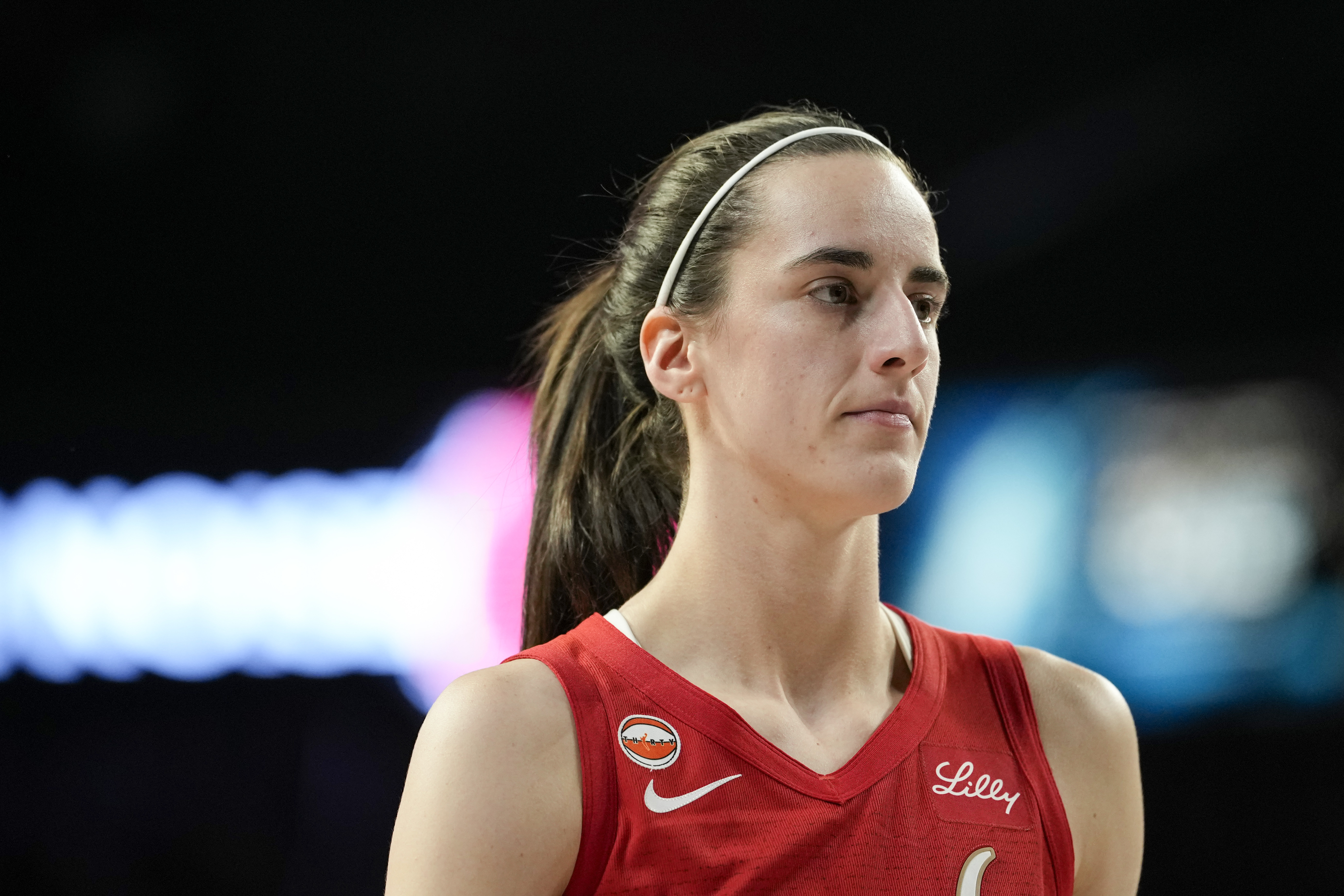 Indiana Fever guard Caitlin Clark (22) looks on as we break down our Valkyries vs. Fever prediction.