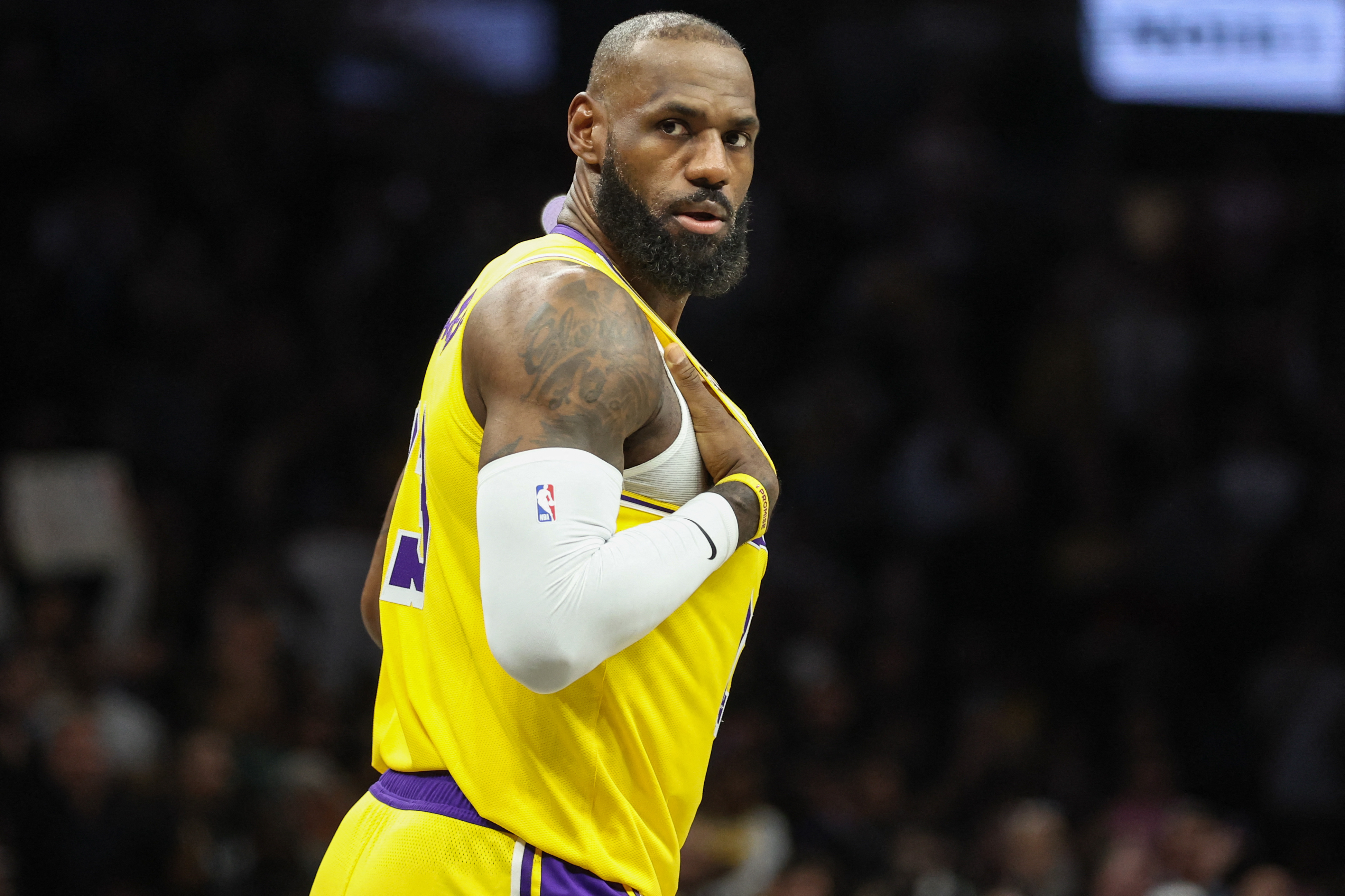 Los Angeles Lakers forward LeBron James (23), seen here checking back into a game, in featured in our Warriors vs. Lakers player props tonight.