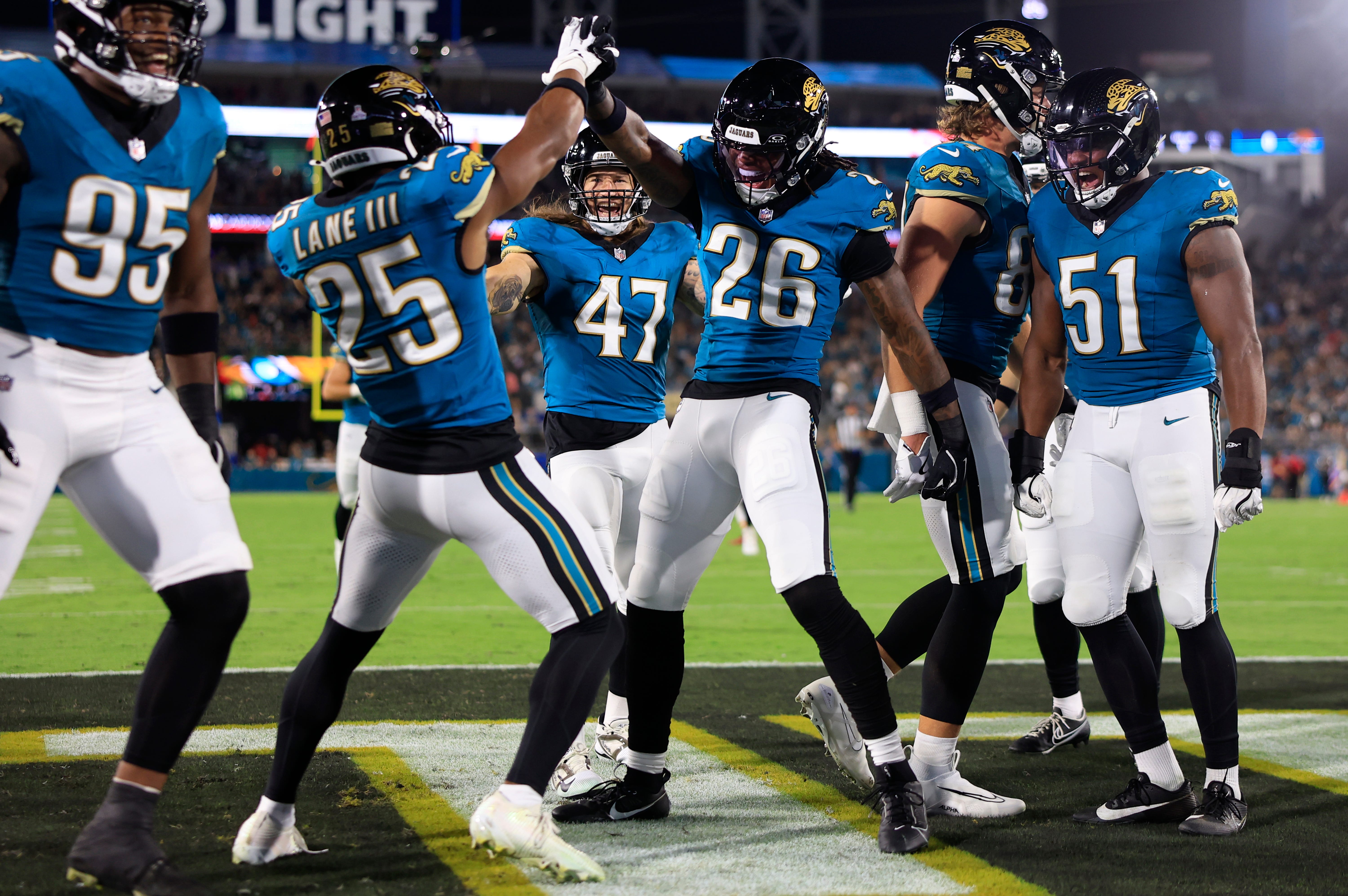 Jacksonville Jaguars safety Rayuan Lane III dances as we look at Robinhood releasing NFL prediction market parlays