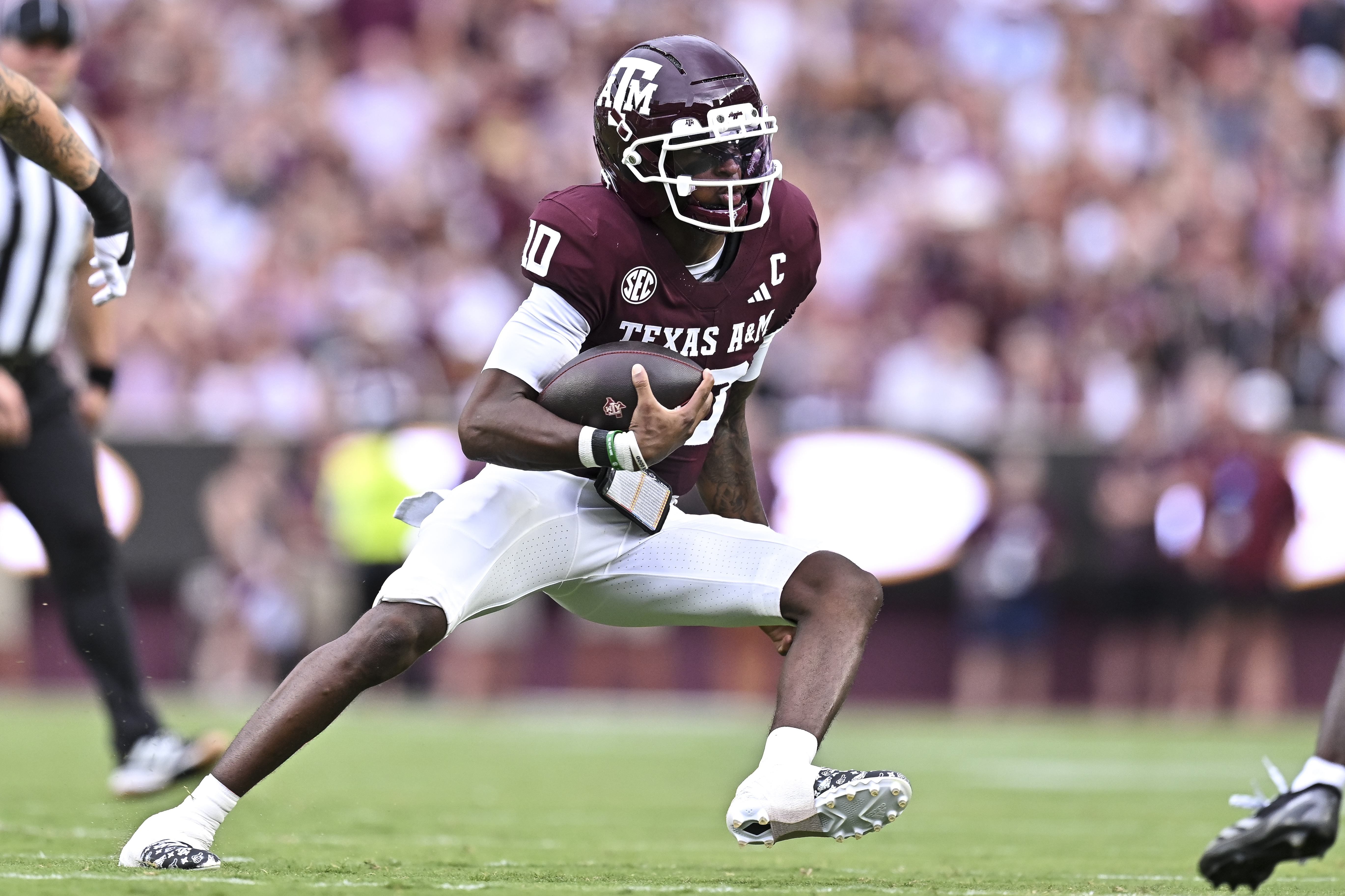 Texas A&M quarterback Marcel Reed running the football as we break down our early Arizona State vs. Texas A&M predictions. Photo by Maria Lysaker-Imagn Images.