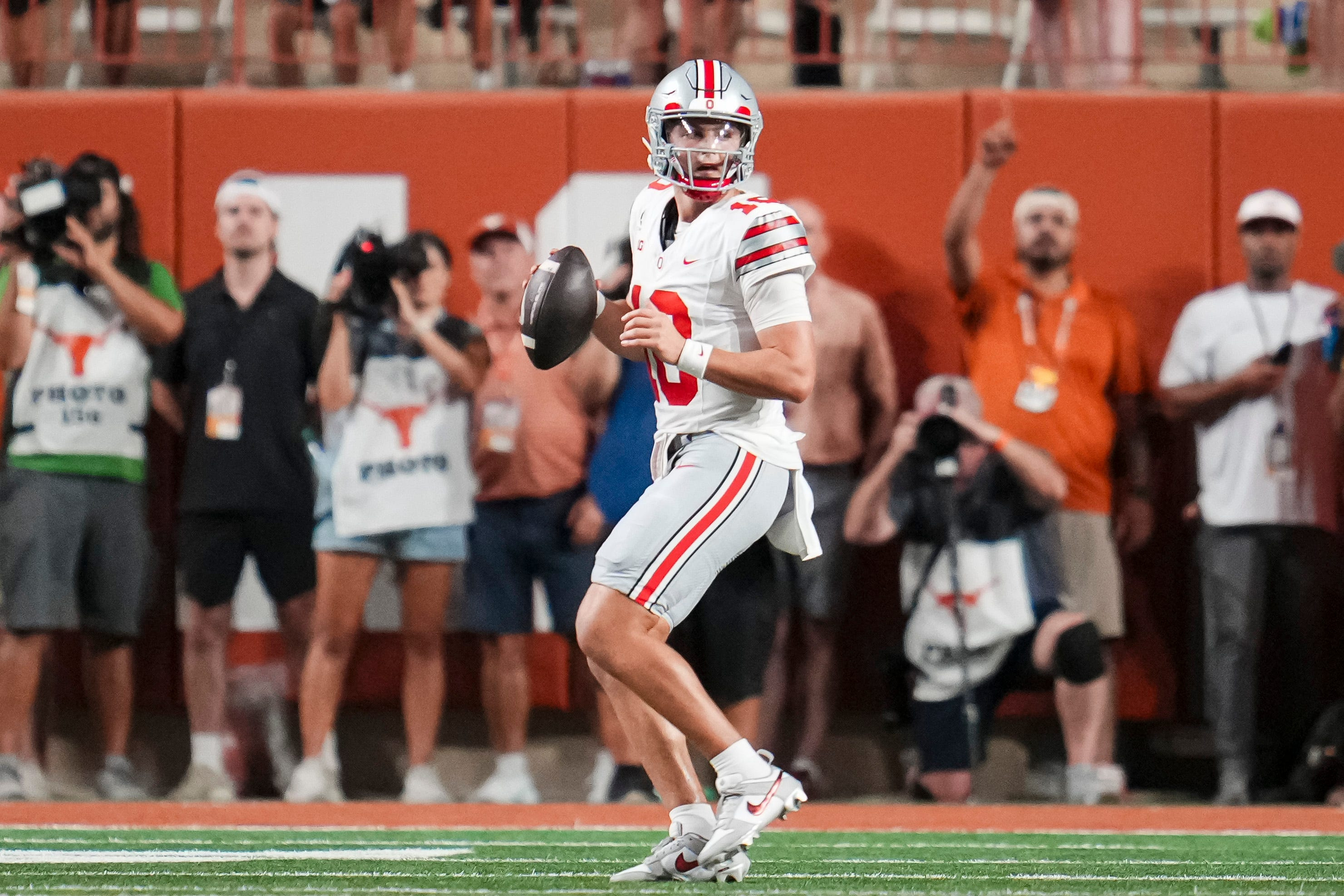 Pictured: Ohio State quarterback Julian Sayin throwing a pass as we break down our College Football Week 4 AI Predictions. Photo by USA TODAY Network via Reuters Connect.