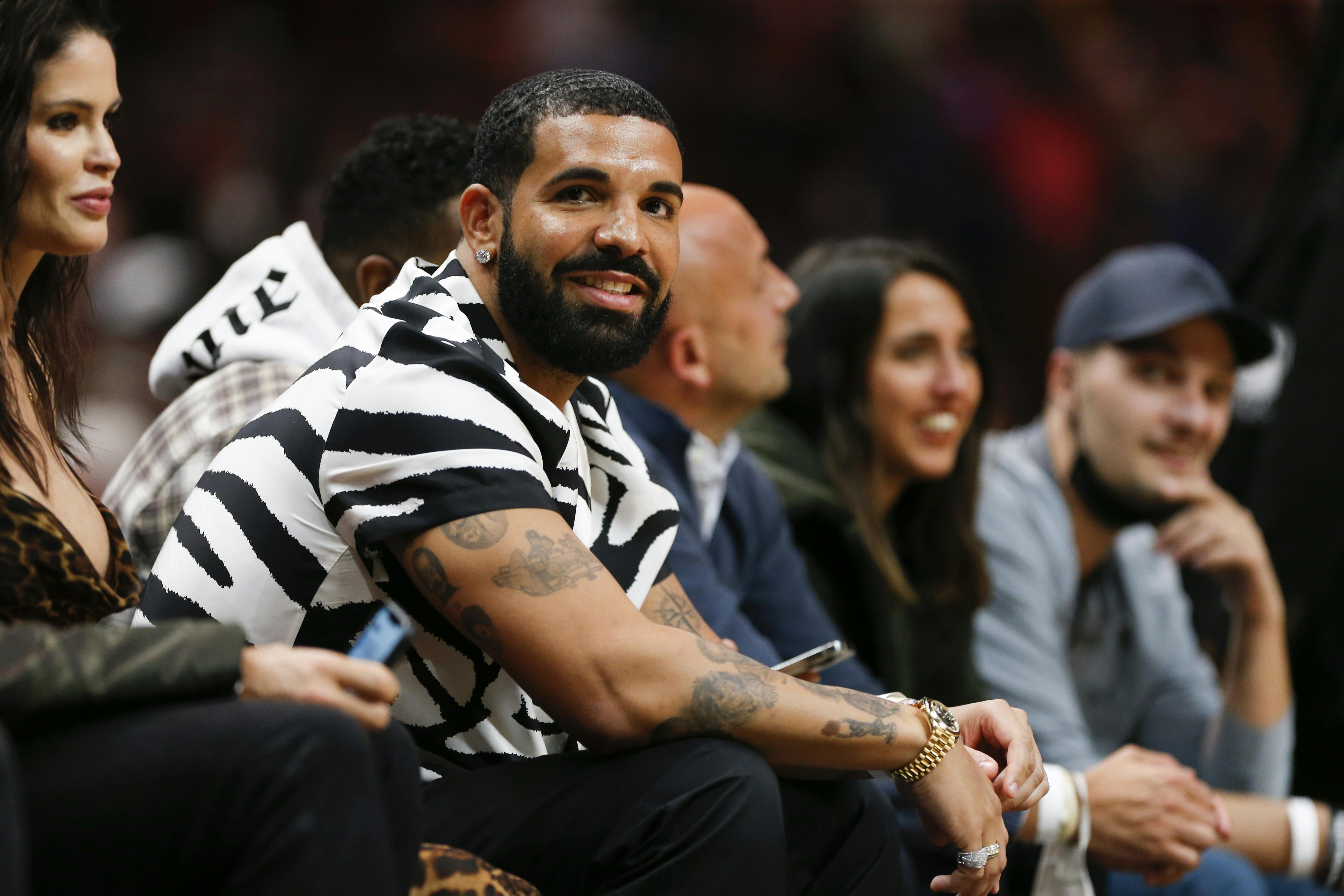 Canadian rapper Drake attends the game between the Miami Heat and the Atlanta Hawks at FTX Arena.