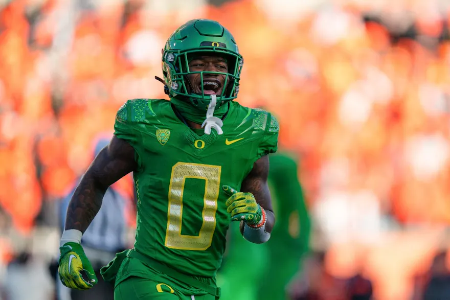 Running back Bucky Irving of the Oregon Ducks reacts as we share our favorite Oregon vs. Washington pick.